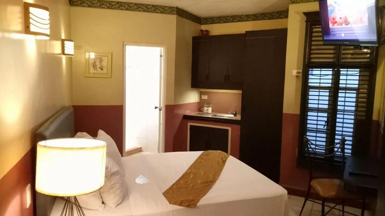 Bedroom in DM Residente Hotel Inns & Villas