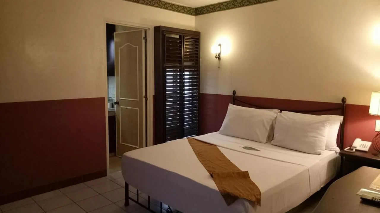 Bedroom, Bed in DM Residente Hotel Inns & Villas