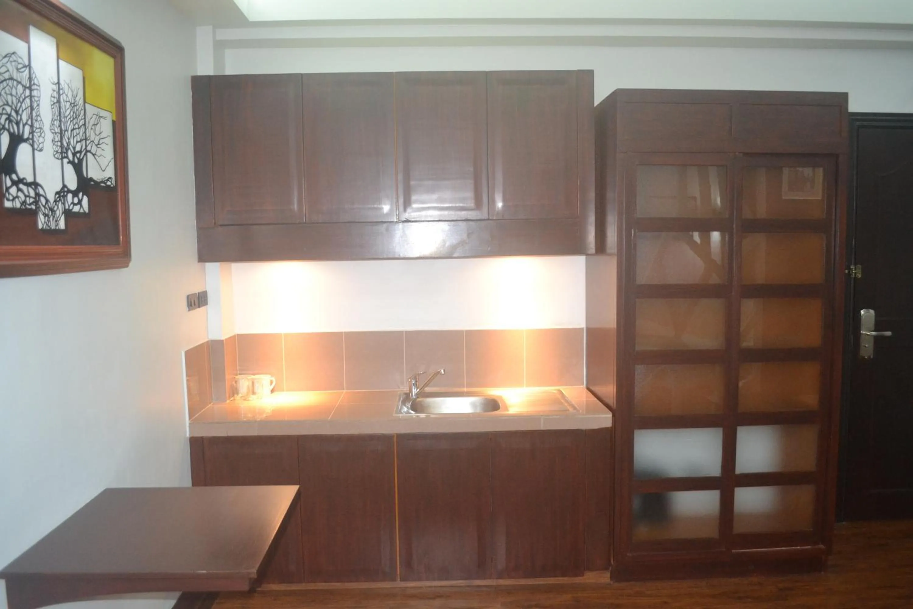 Kitchen or kitchenette in DM Residente Hotel Inns & Villas