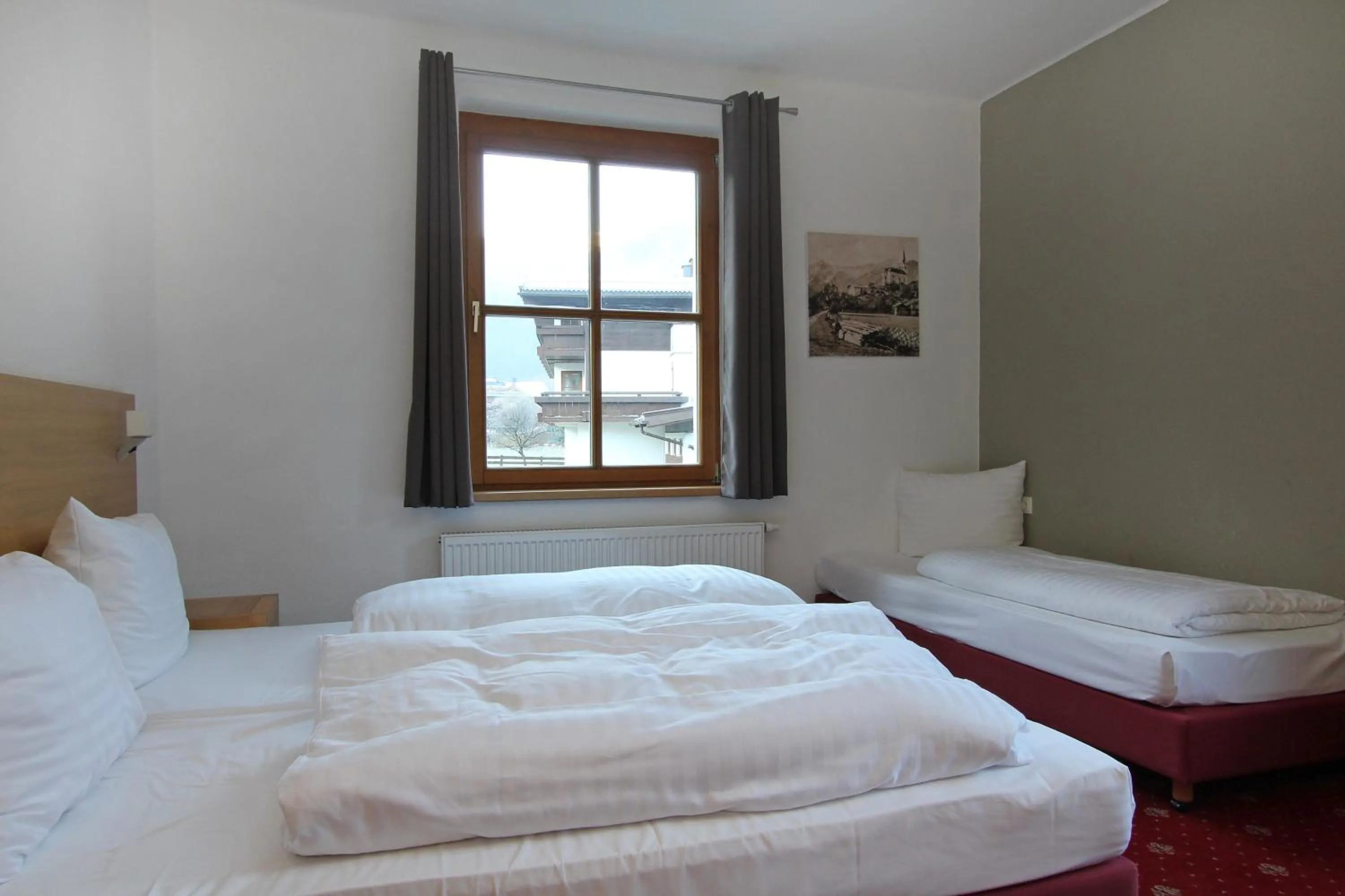 Bed in Kitz Residenz by Alpin Rentals