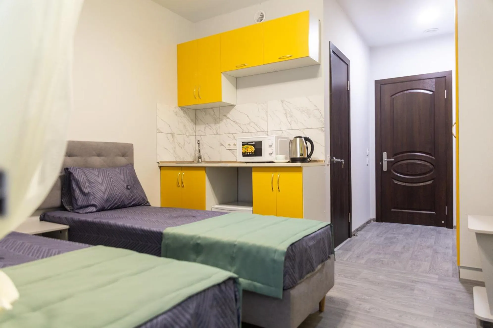 Kitchen or kitchenette, Bed in Zenith Hotel