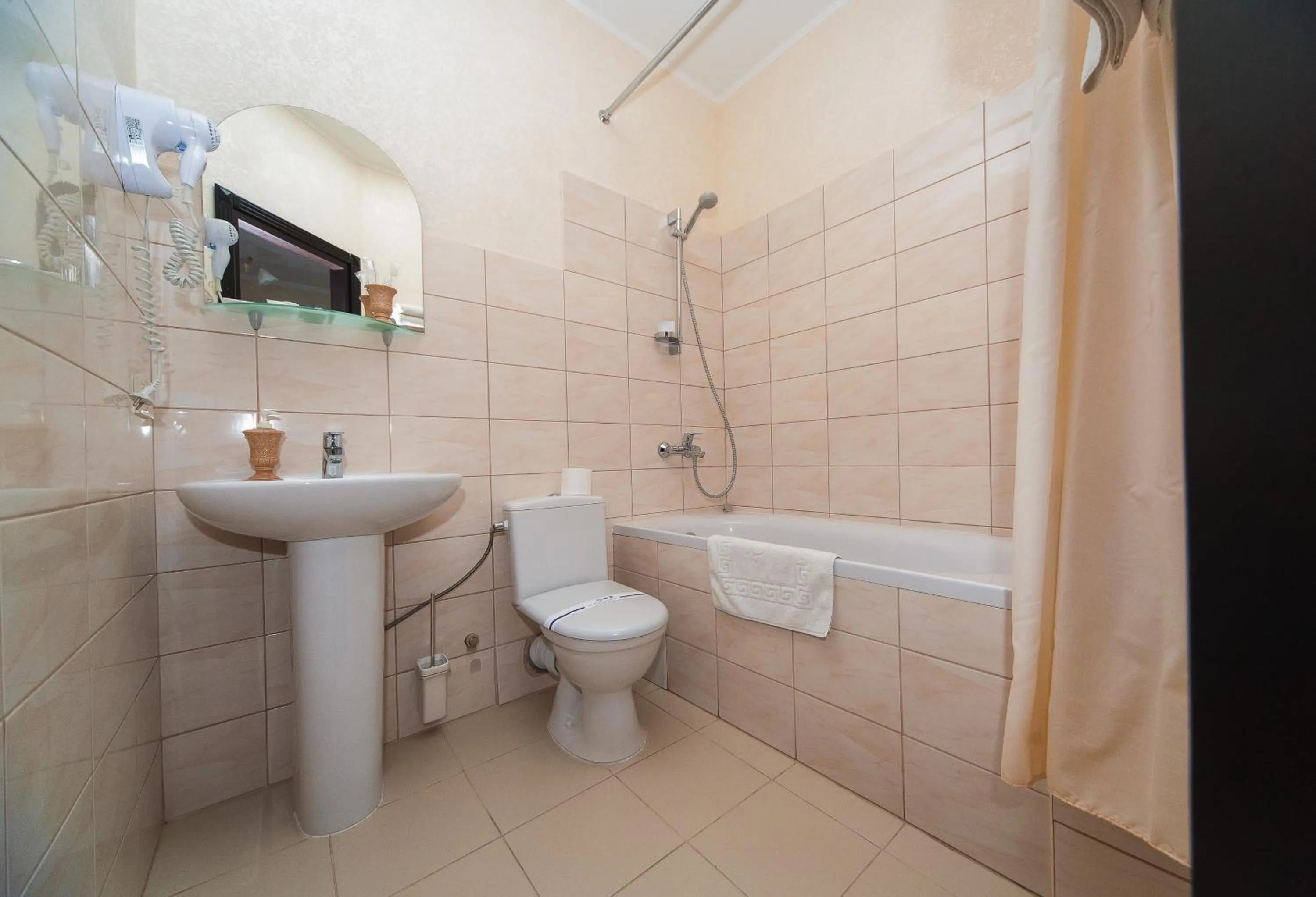 Toilet in Zenith Hotel