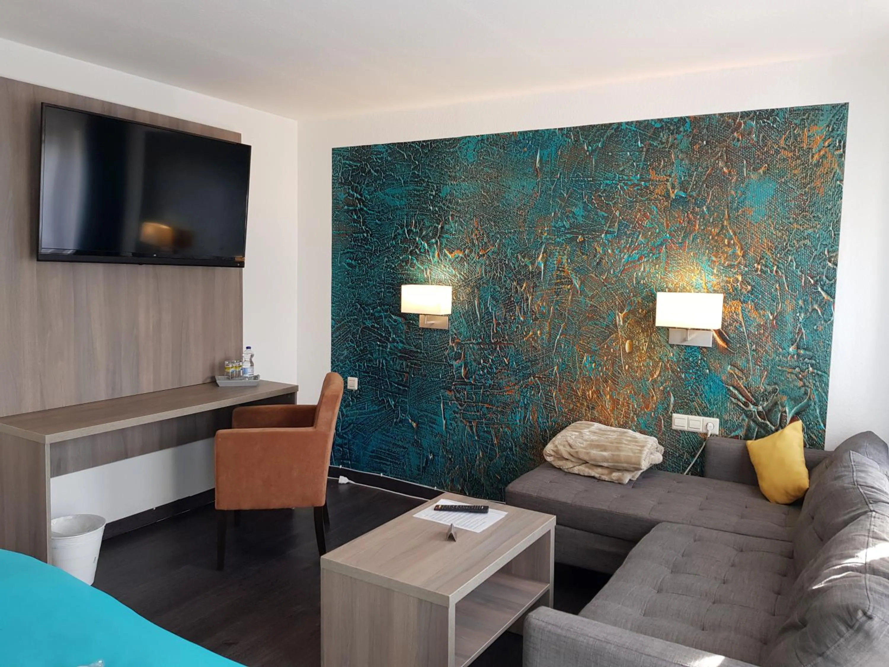 Seating area, Bed in Hotel Milin