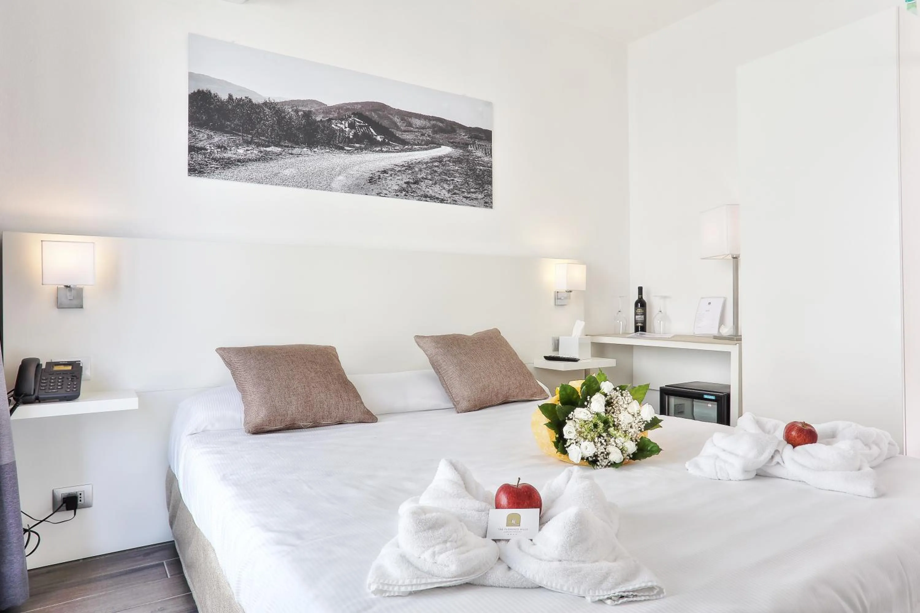 Bed in The Florence Hills Resort & Wellness