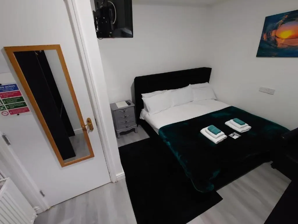 Bedroom, Bed in High Tide Hotel Oyo