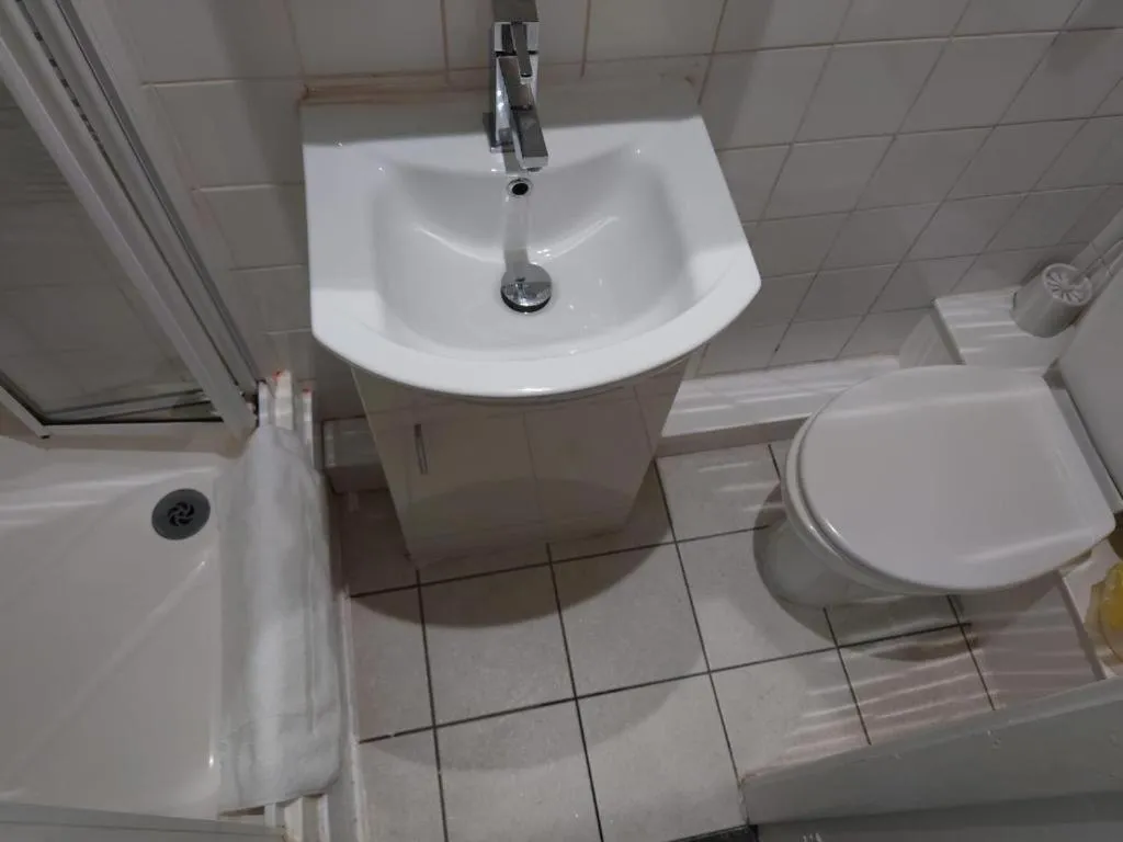 Bathroom in High Tide Hotel Oyo