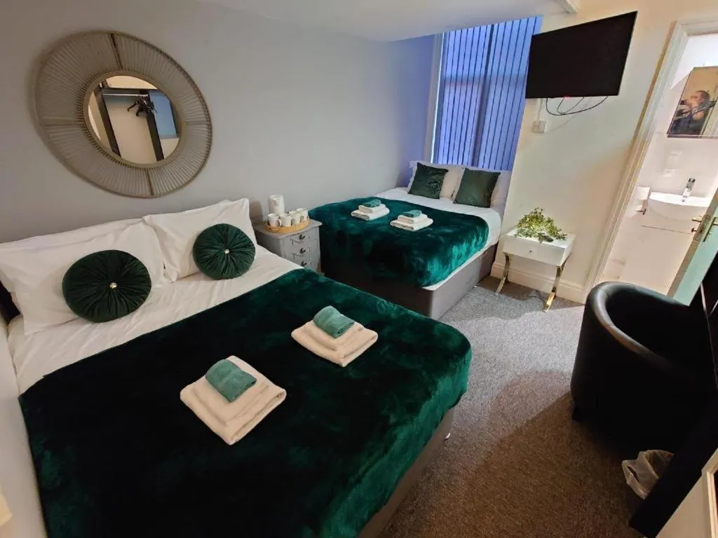 Bedroom in High Tide Hotel Oyo