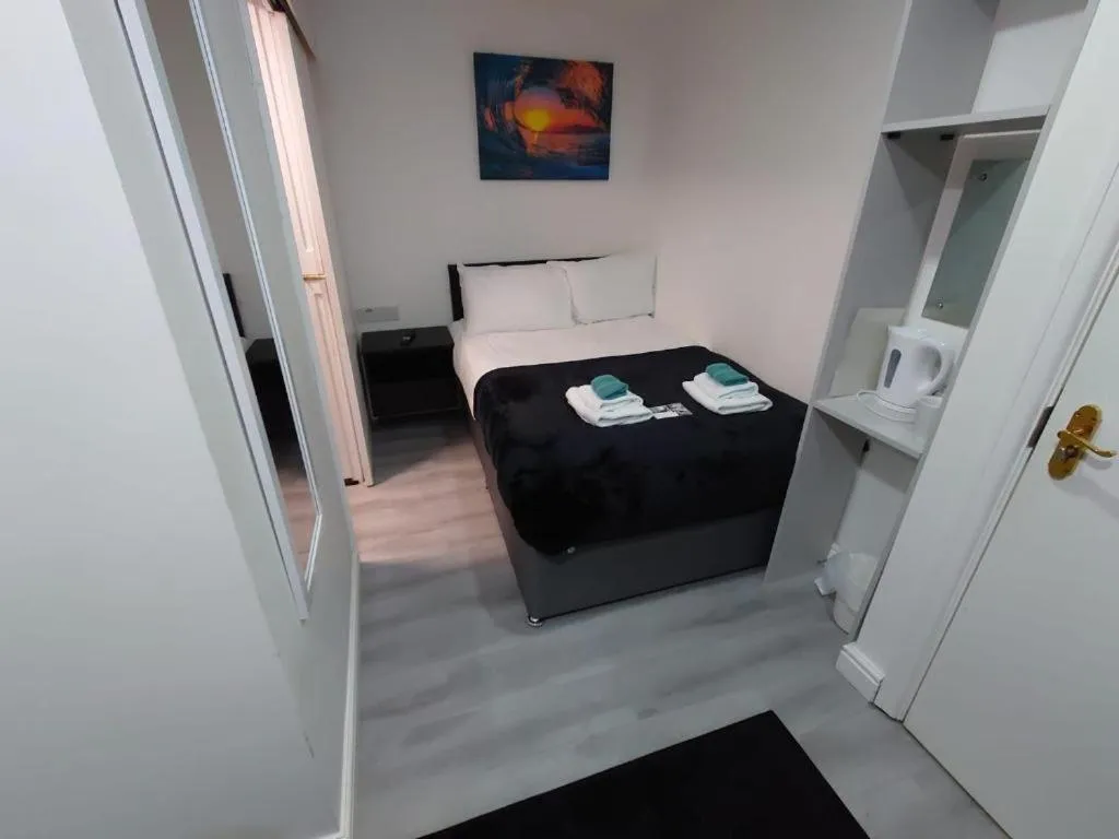 Bedroom, Bed in High Tide Hotel Oyo