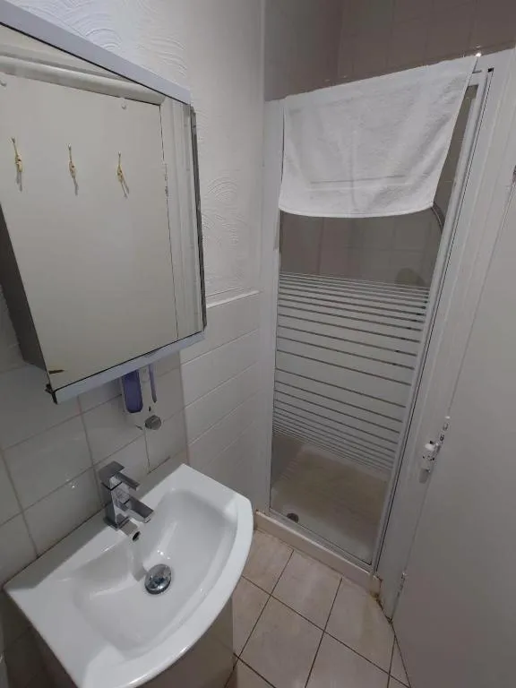 Bathroom in High Tide Hotel Oyo