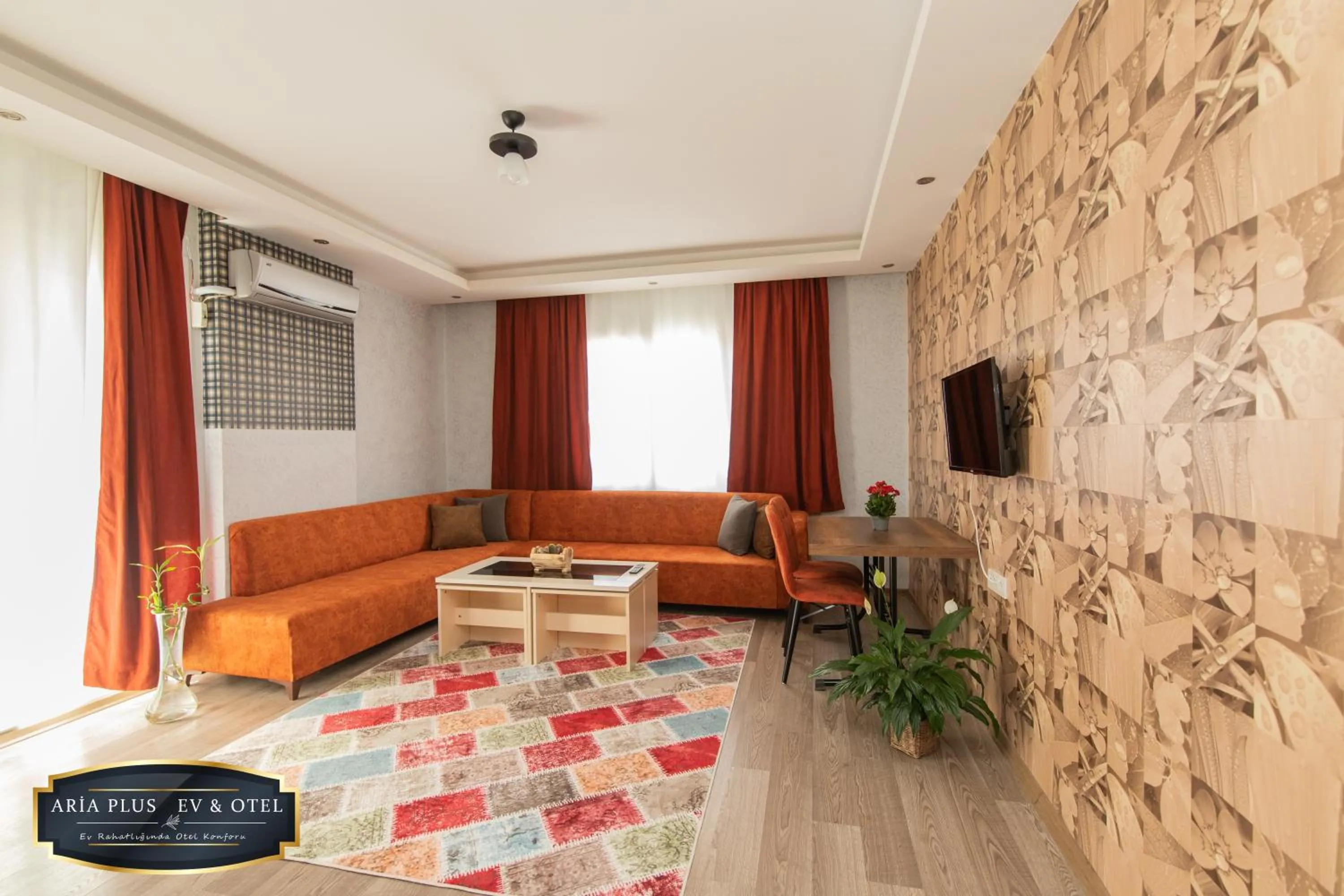 Living room in aria plus ev otel