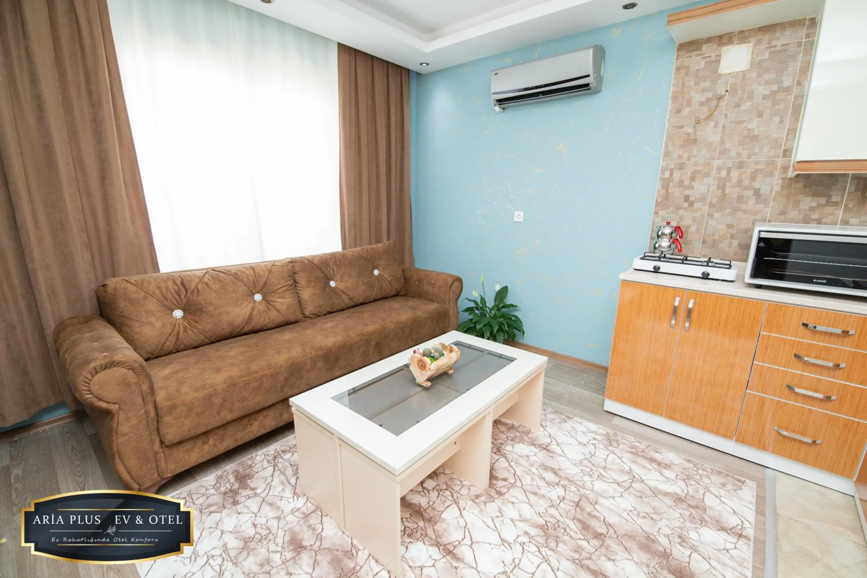 Living room in aria plus ev otel