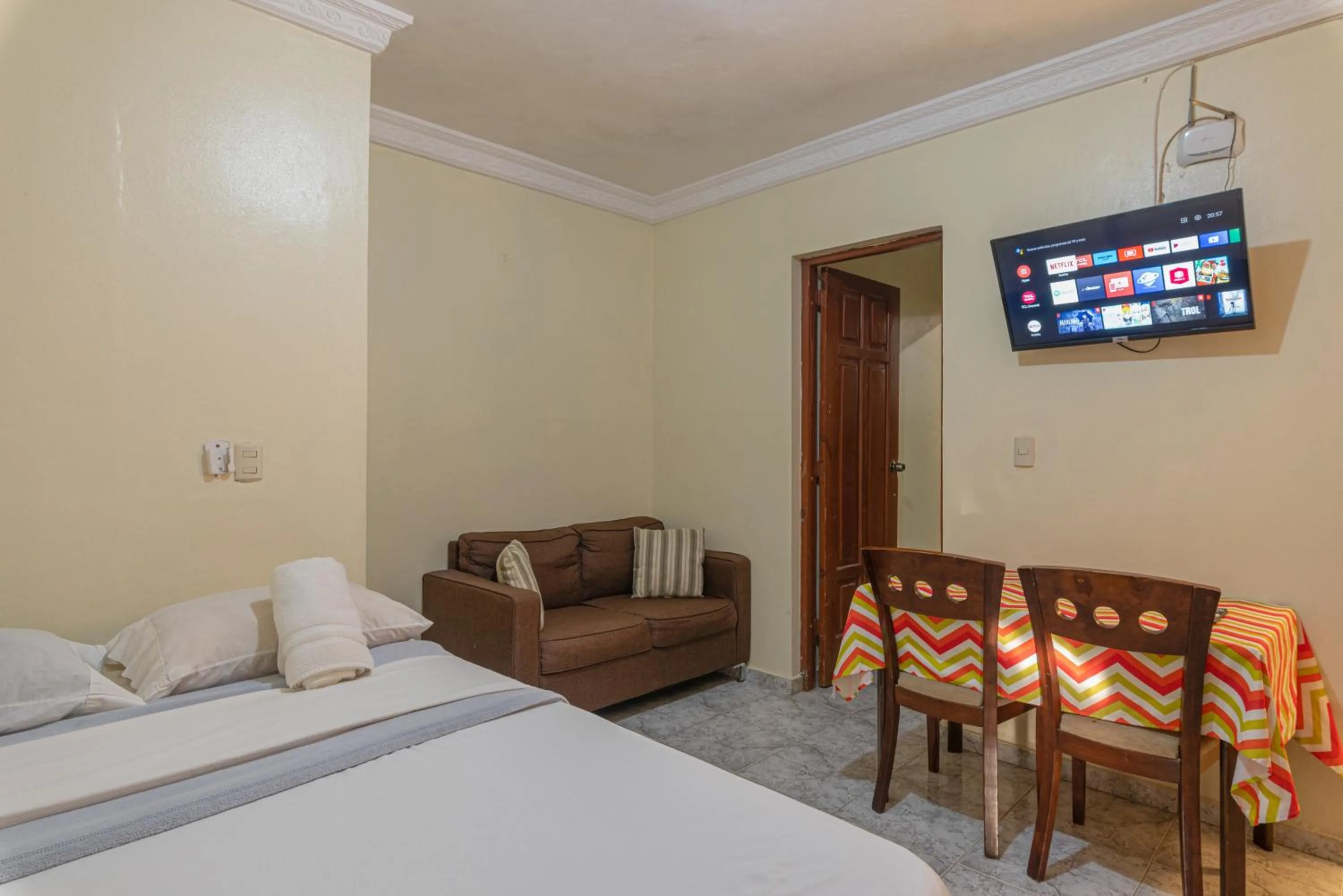 Seating area, Bed in Tropical Island Aparthotel Aeropuerto Santo Domingo