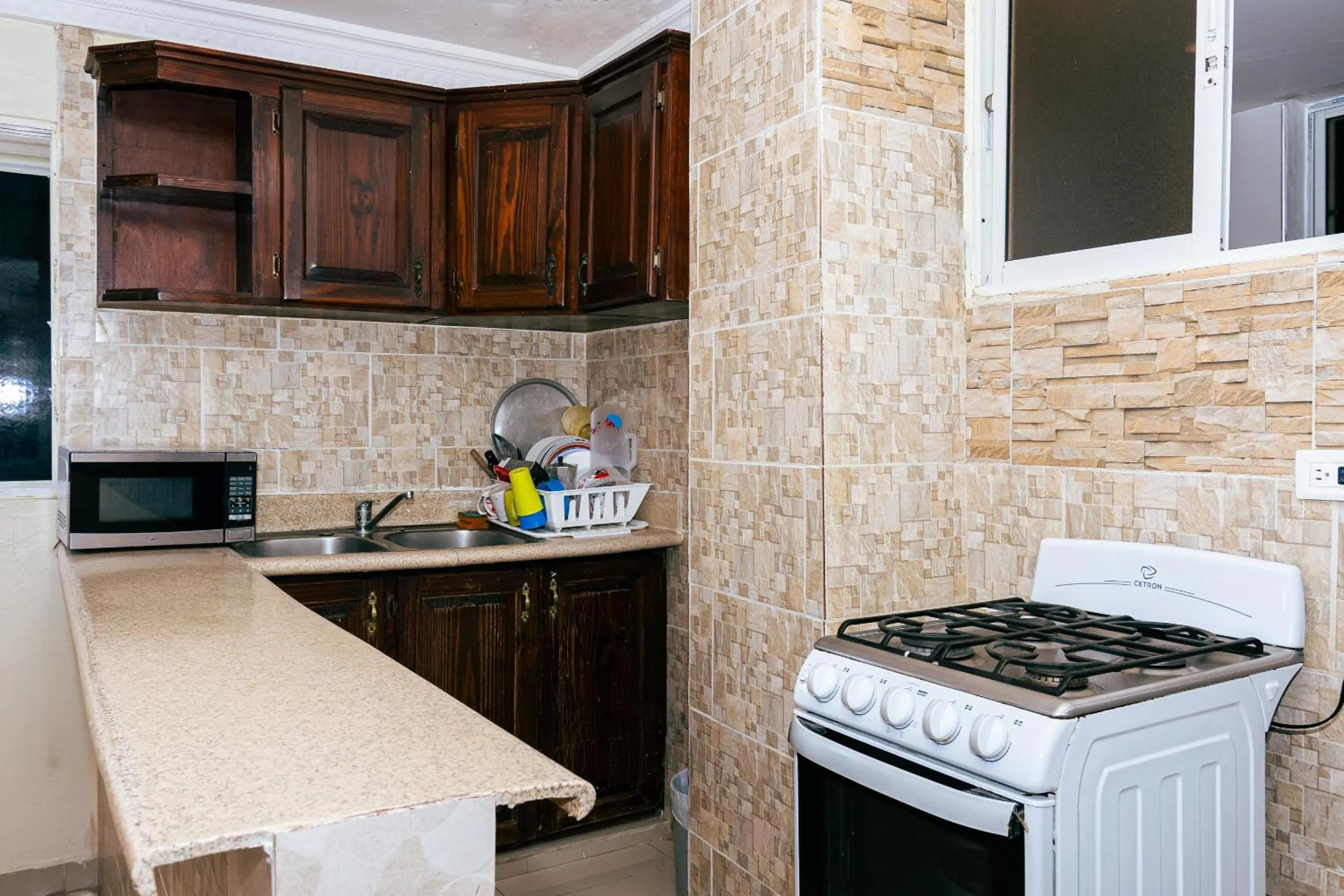 Kitchen or kitchenette in Tropical Island Aparthotel Aeropuerto Santo Domingo