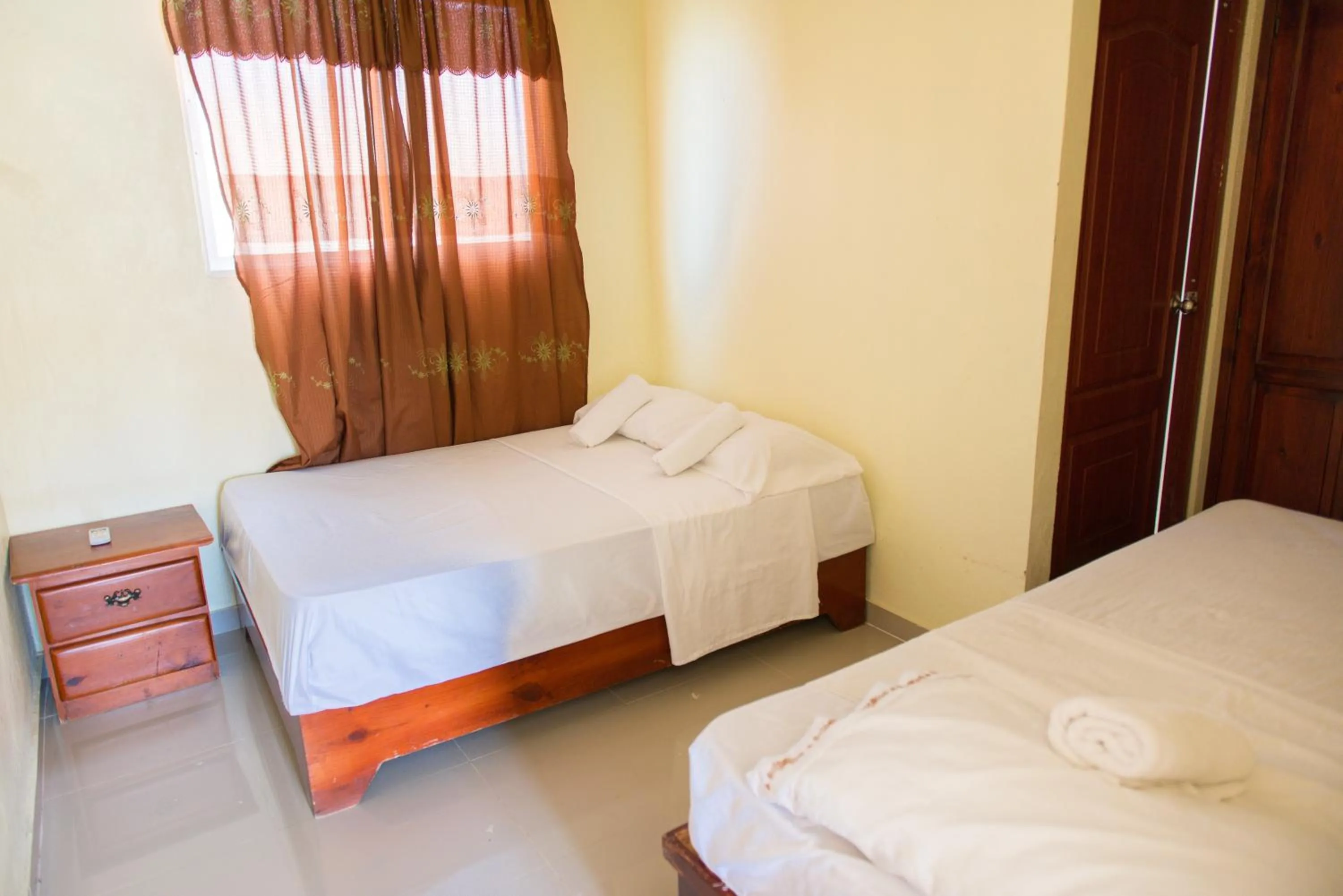 Bed in Tropical Island Aparthotel Aeropuerto Santo Domingo