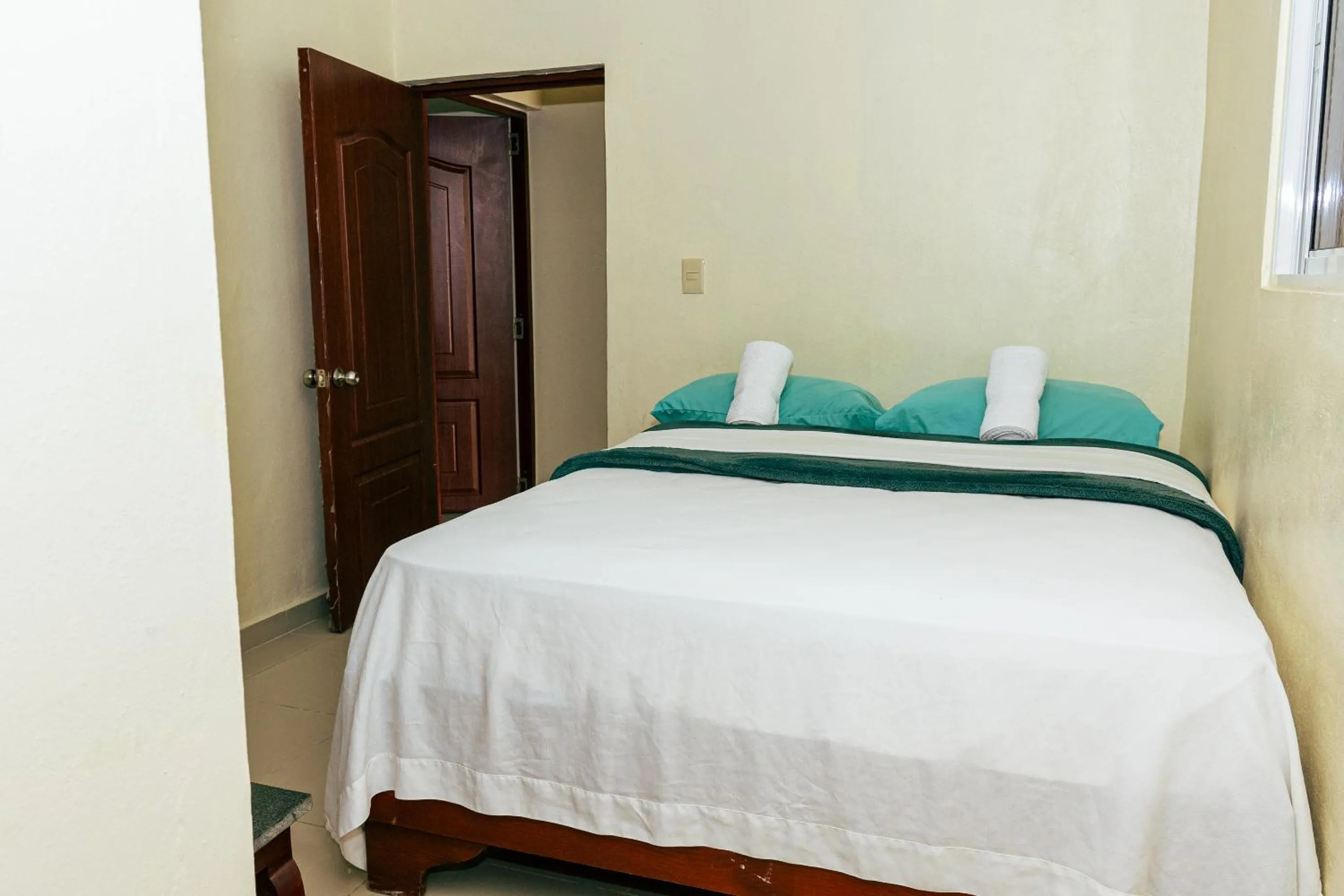 Bed in Tropical Island Aparthotel Aeropuerto Santo Domingo