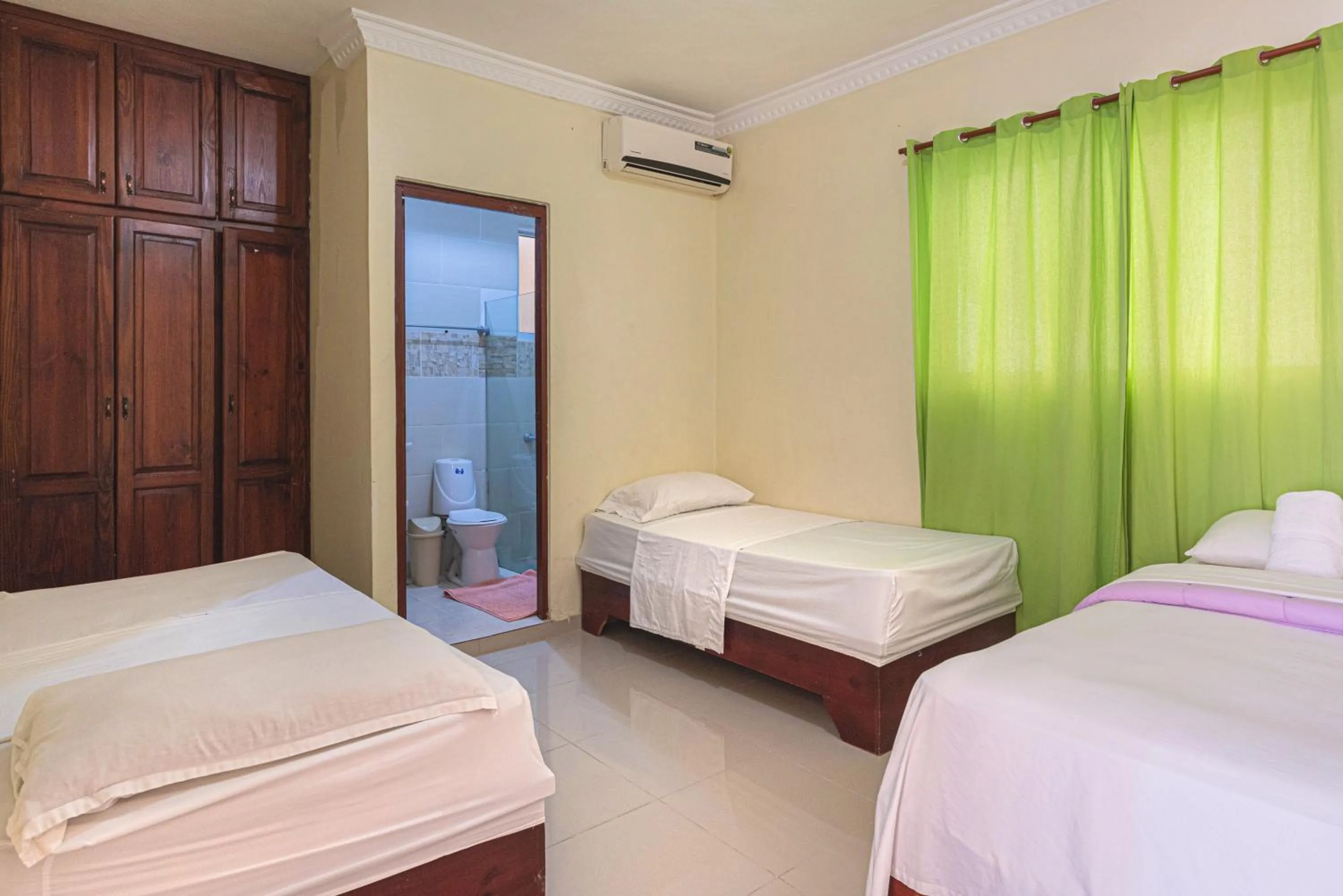 Bedroom, Bed in Tropical Island Aparthotel Aeropuerto Santo Domingo