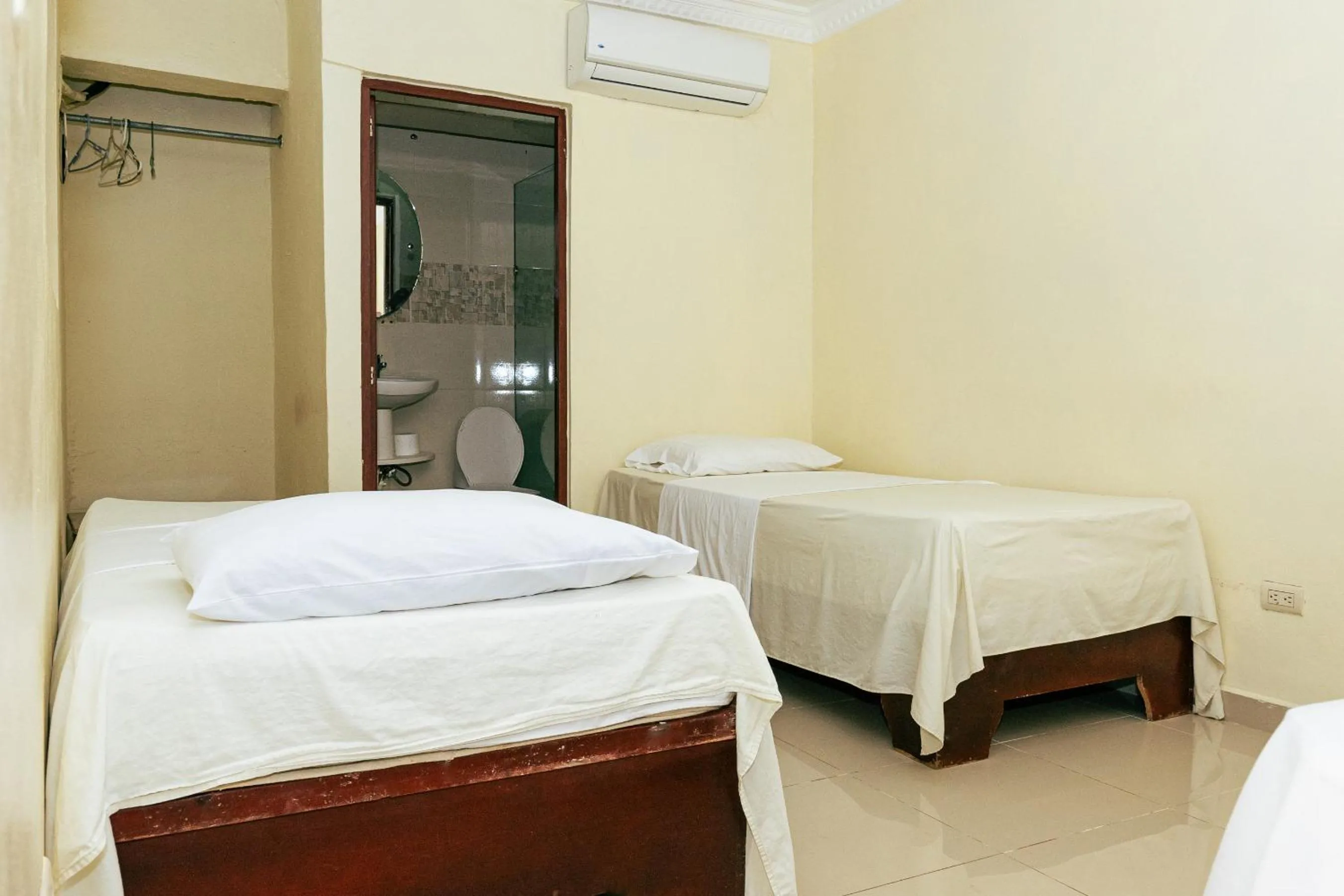 Bed in Tropical Island Aparthotel Aeropuerto Santo Domingo