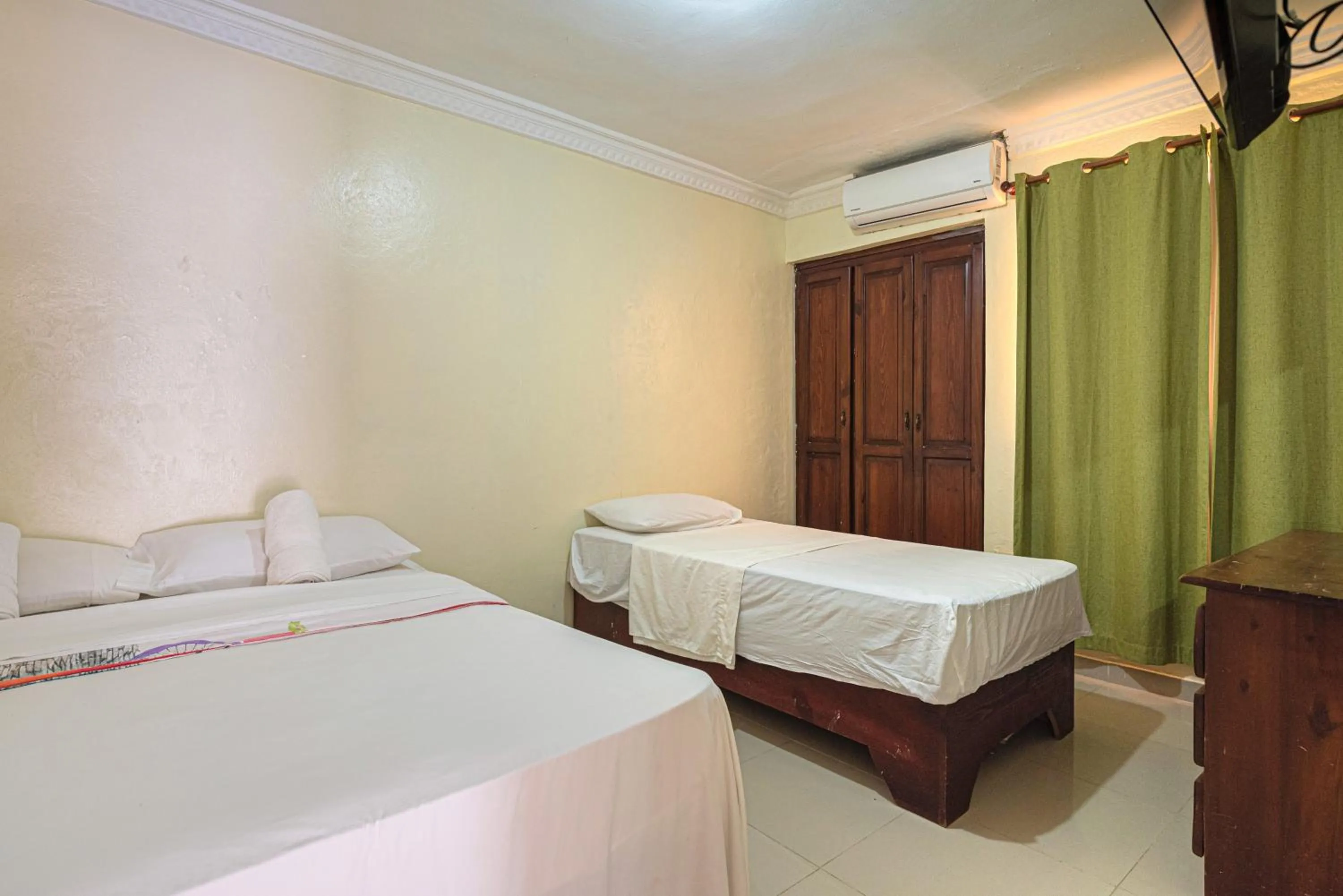 Bedroom, Bed in Tropical Island Aparthotel Aeropuerto Santo Domingo