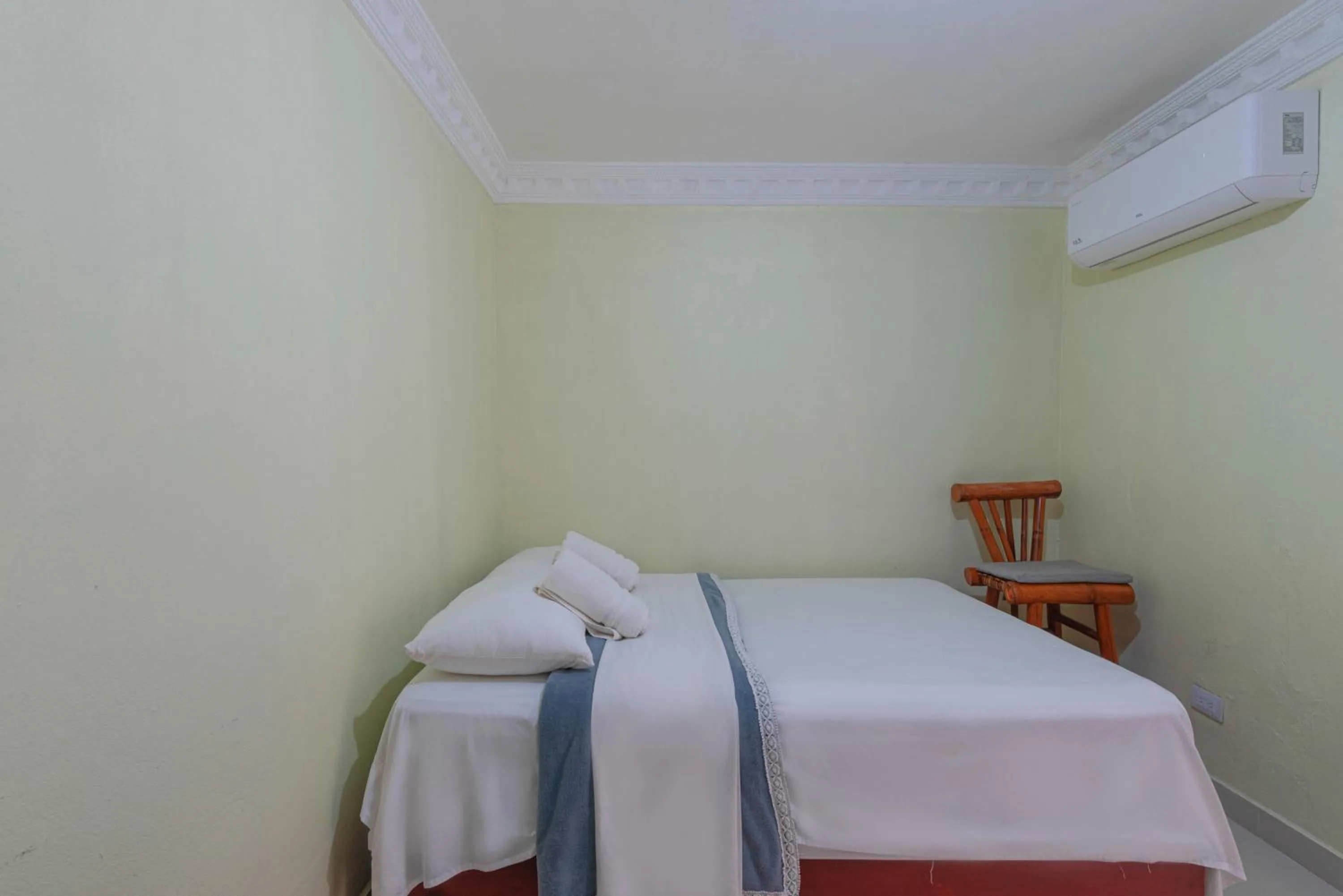 Bed in Tropical Island Aparthotel Aeropuerto Santo Domingo
