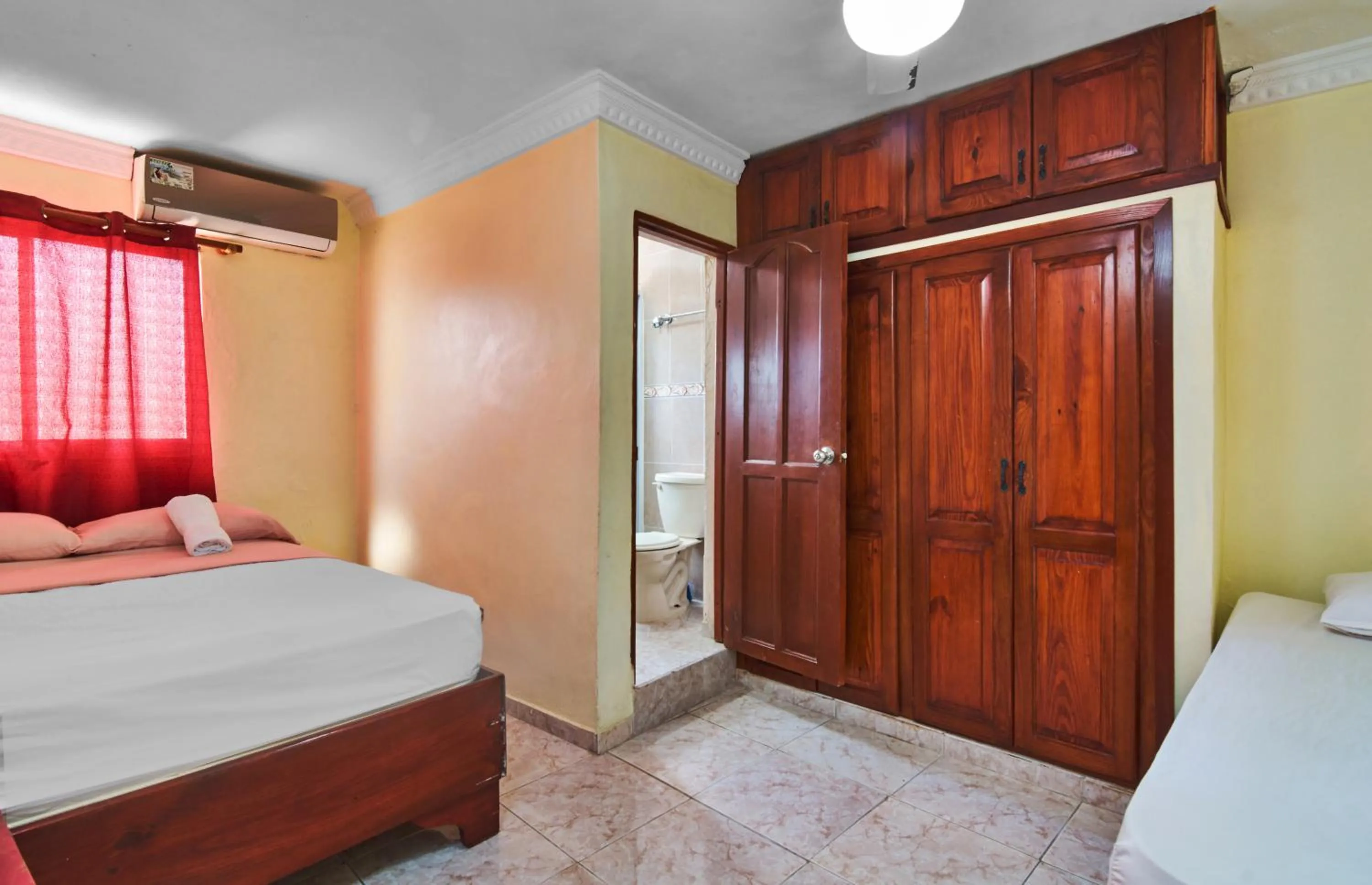 Bedroom, Bed in Tropical Island Aparthotel Aeropuerto Santo Domingo