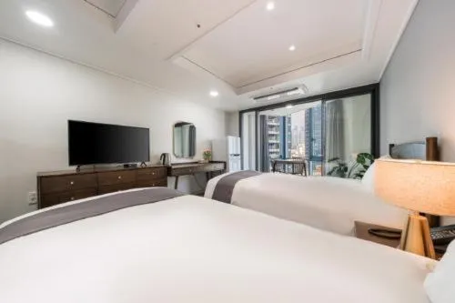 Bed in Haeundae Central Hotel