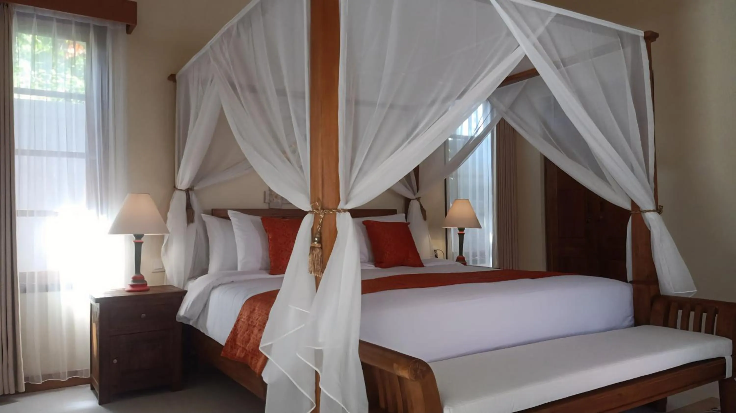Bed in Bebek Cottages Sanur