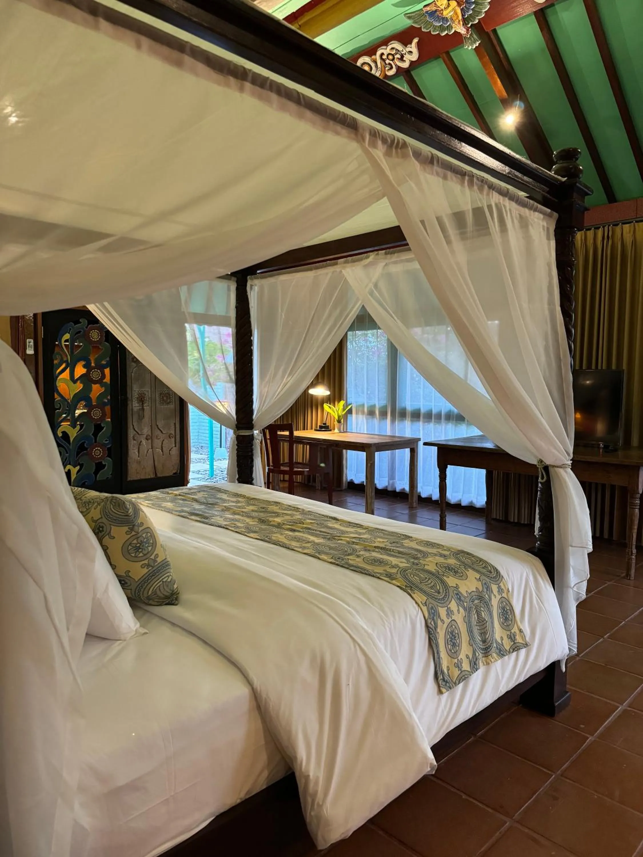 Bed in Bebek Cottages Sanur