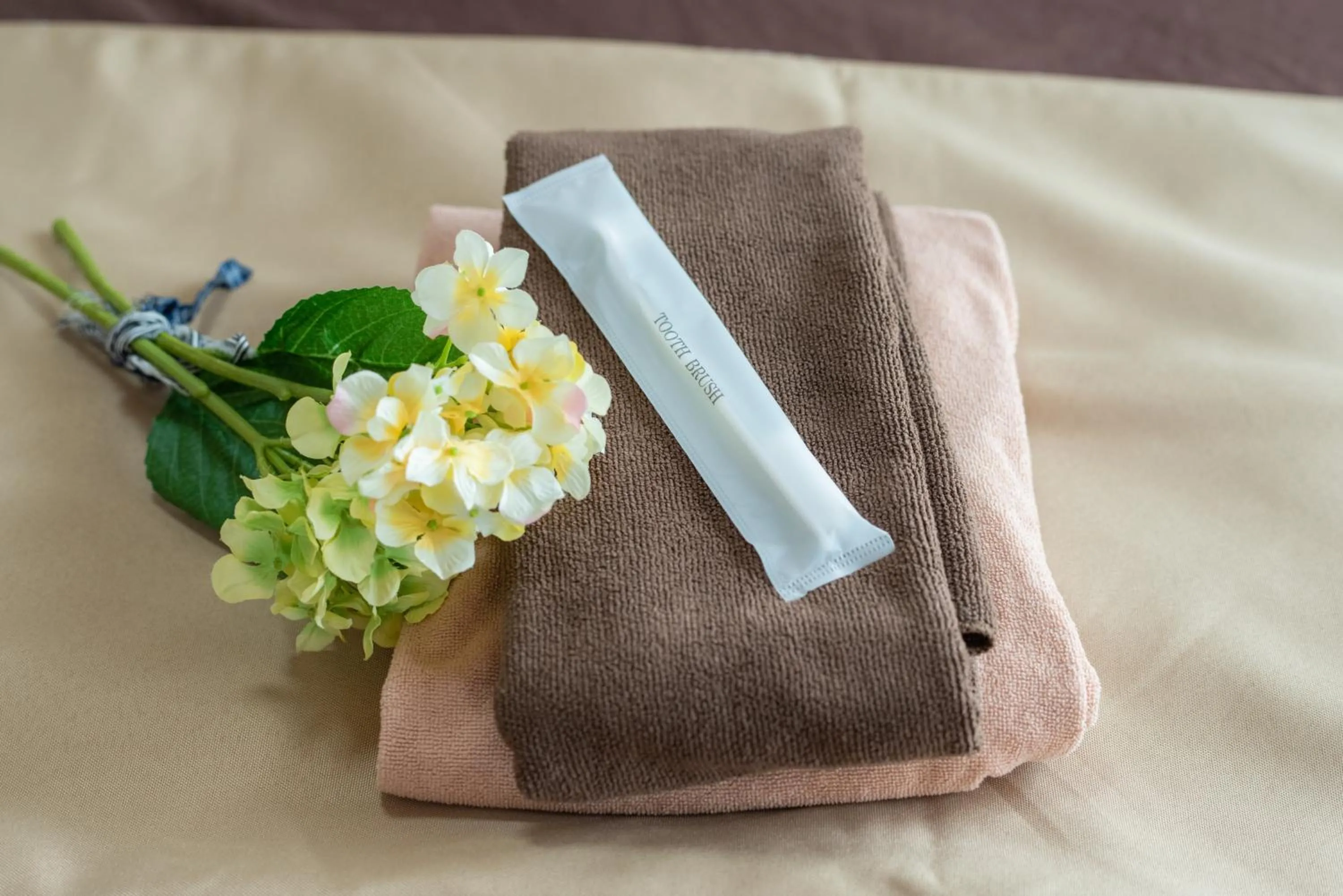 towels in ゲストハウス EZO Run Sapporo 札幌中心部でシンプルな滞在ができるホステル