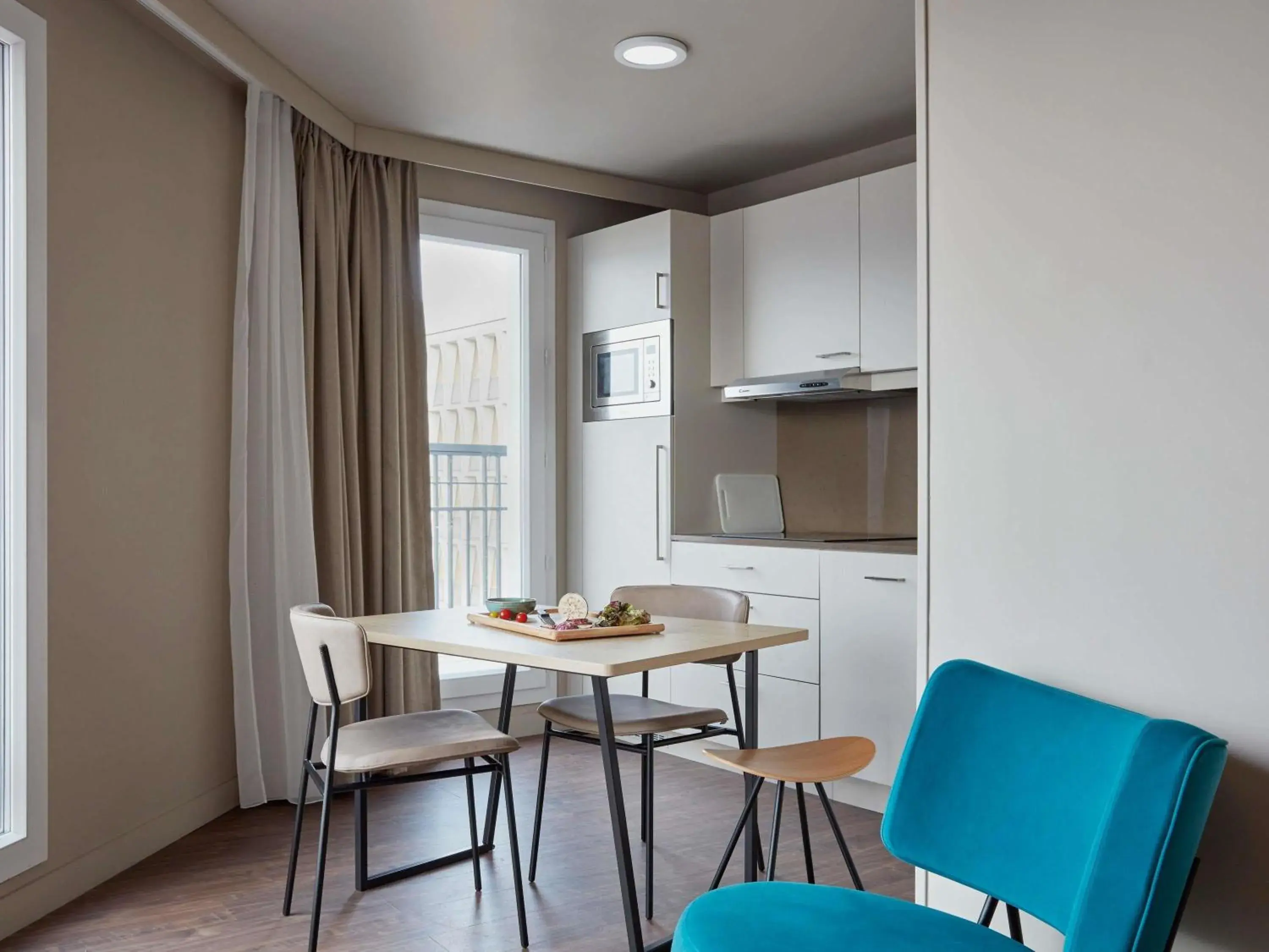 Bedroom in Aparthotel Adagio Paris Suresnes Longchamp Bedroom in Aparthotel Adagio Paris Suresnes Longchamp