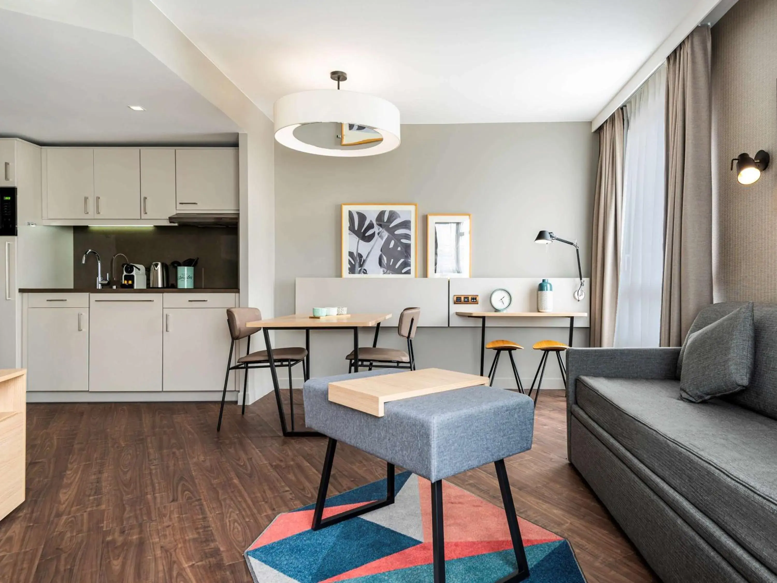 Living room in Aparthotel Adagio Paris Suresnes Longchamp Living room in Aparthotel Adagio Paris Suresnes Longchamp