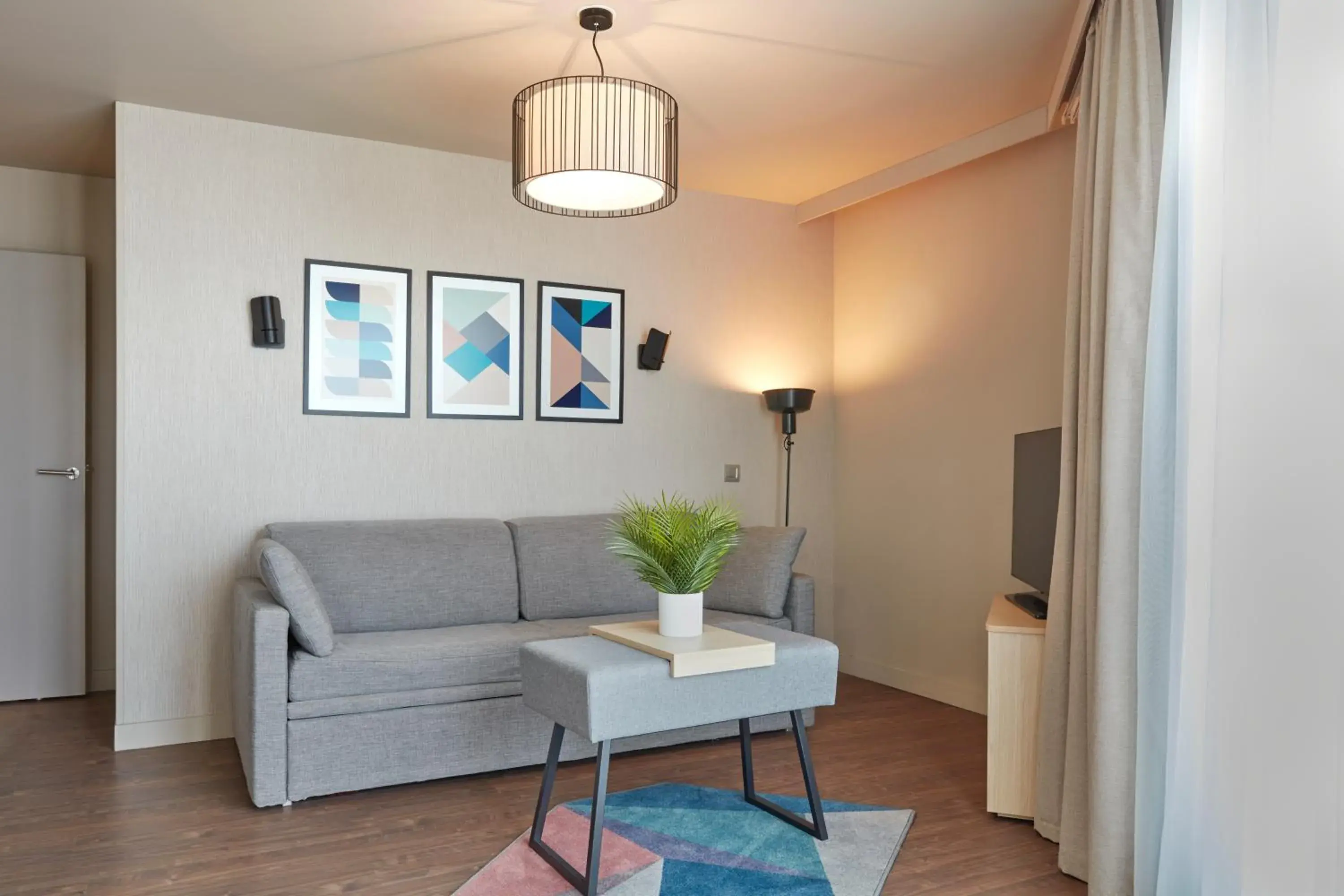 Bedroom in Aparthotel Adagio Paris Suresnes Longchamp Bedroom in Aparthotel Adagio Paris Suresnes Longchamp