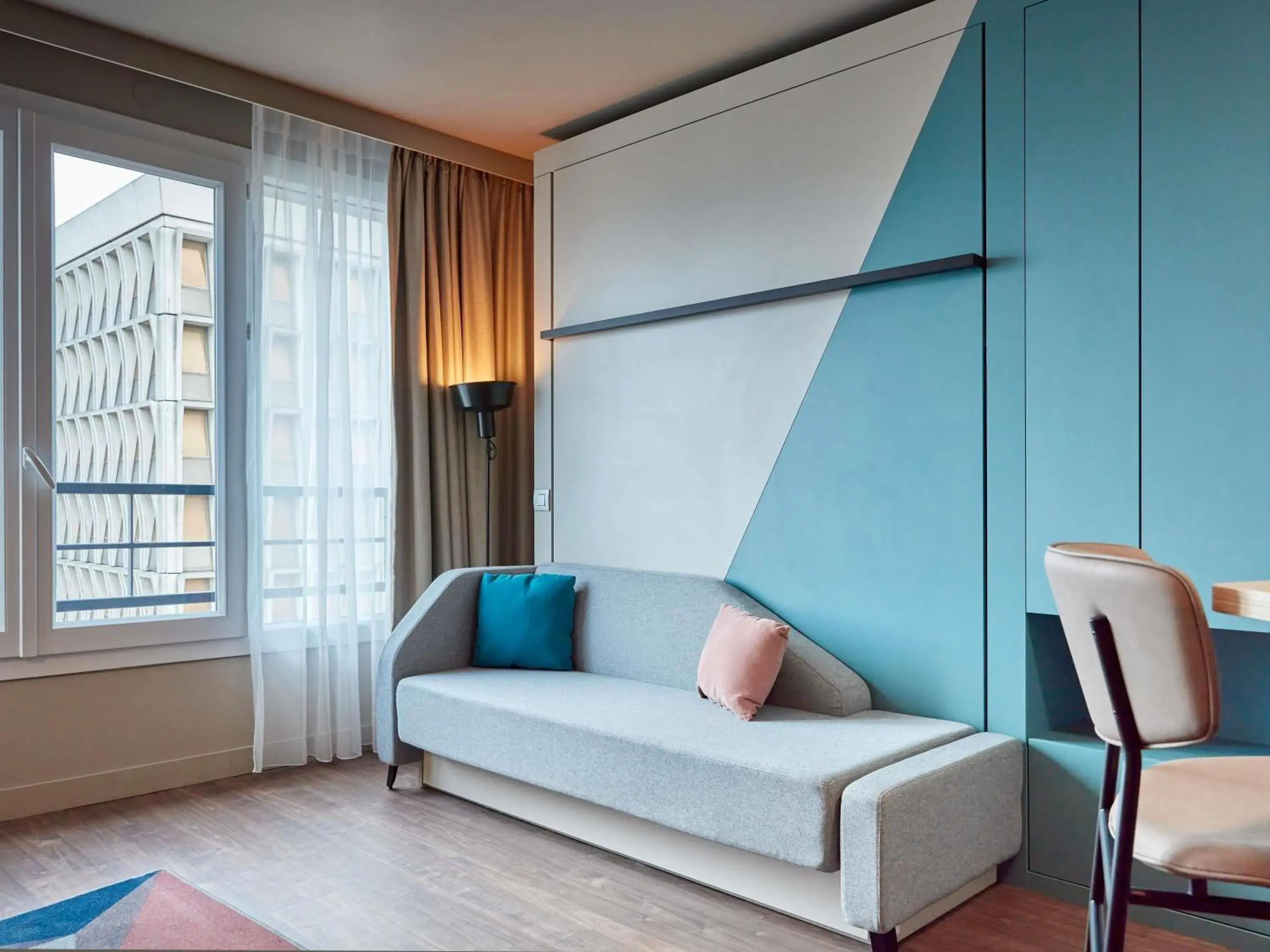 Bedroom in Aparthotel Adagio Paris Suresnes Longchamp Bedroom in Aparthotel Adagio Paris Suresnes Longchamp