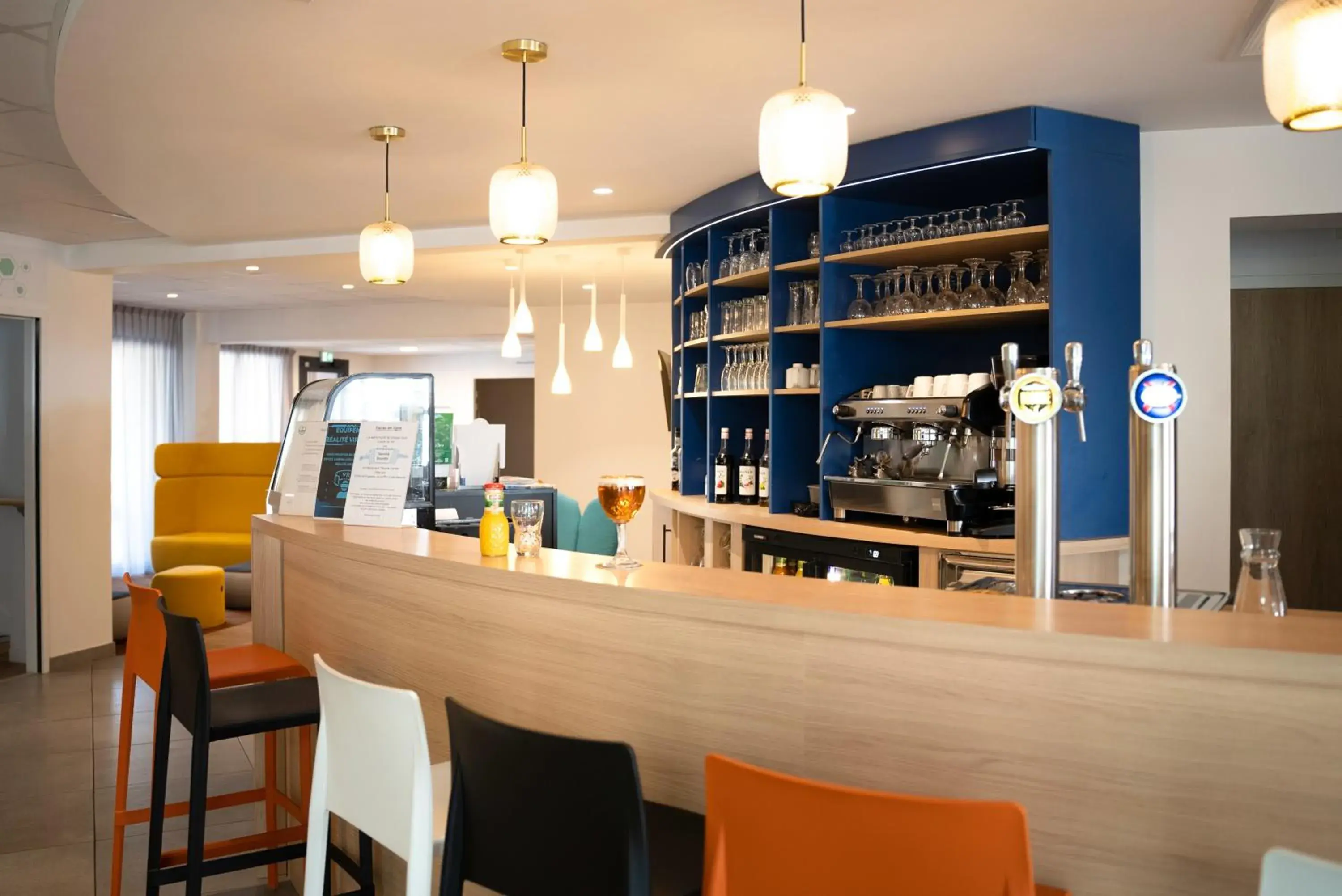 Lounge or bar in ibis Styles Fougeres Lounge or bar in ibis Styles Fougeres