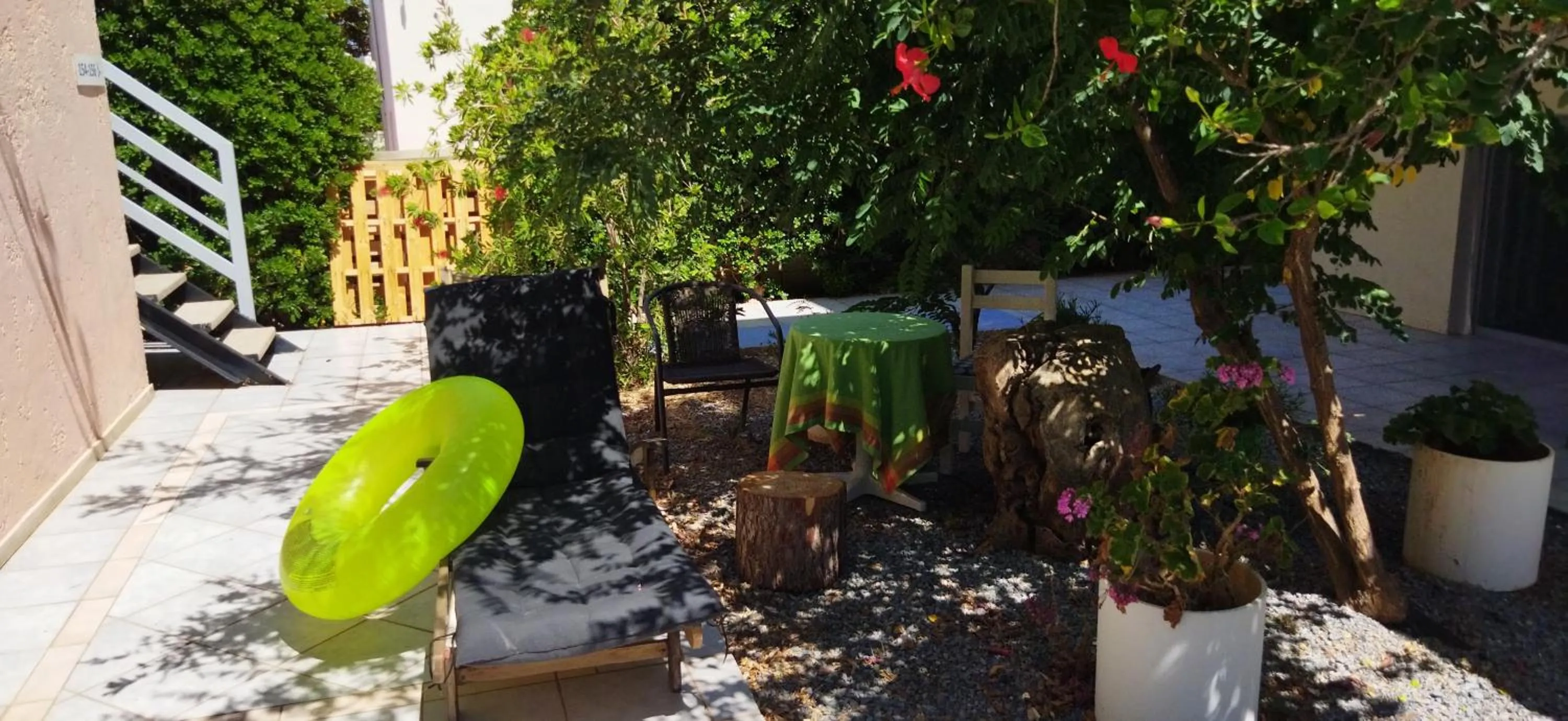 Patio in Cleo Rooms 250m from the beach