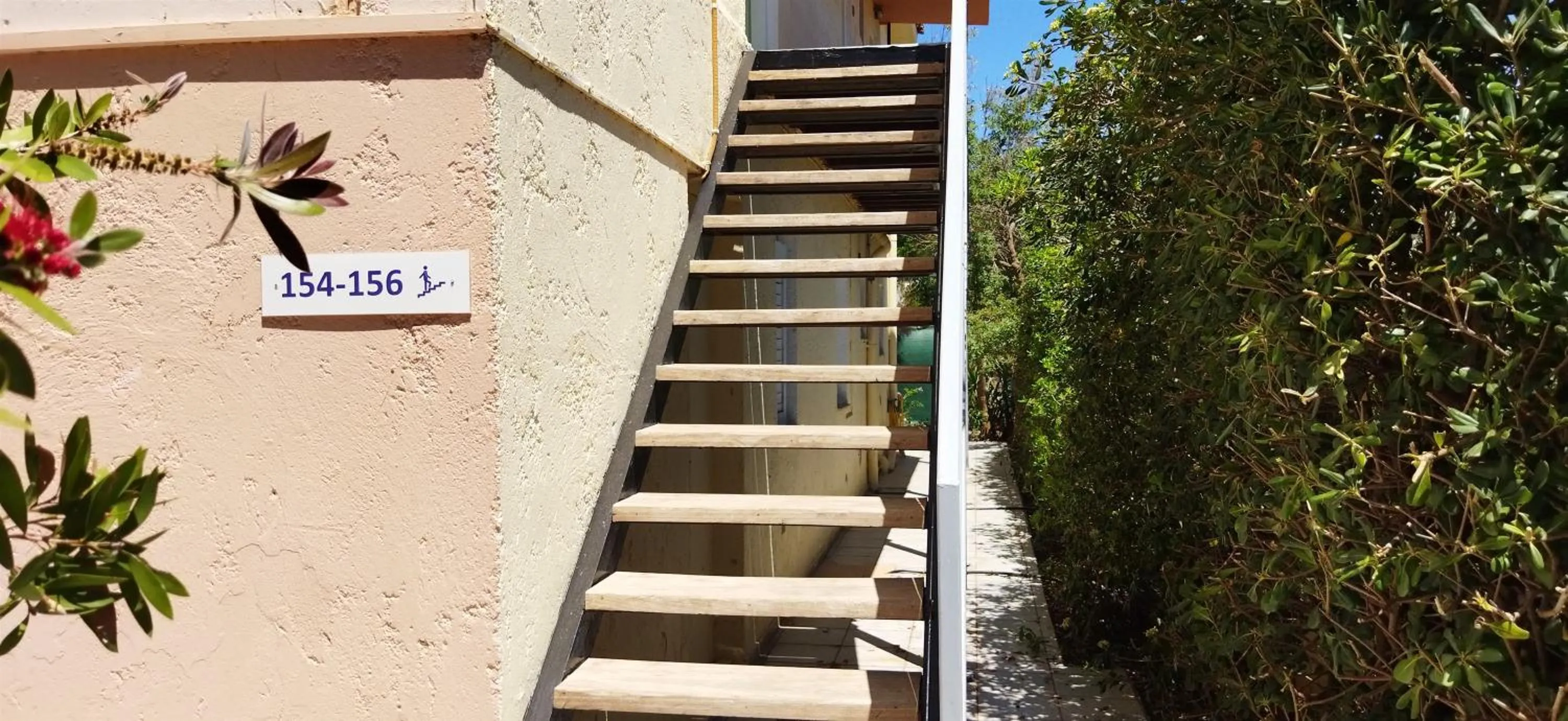 Property building in Cleo Rooms 250m from the beach