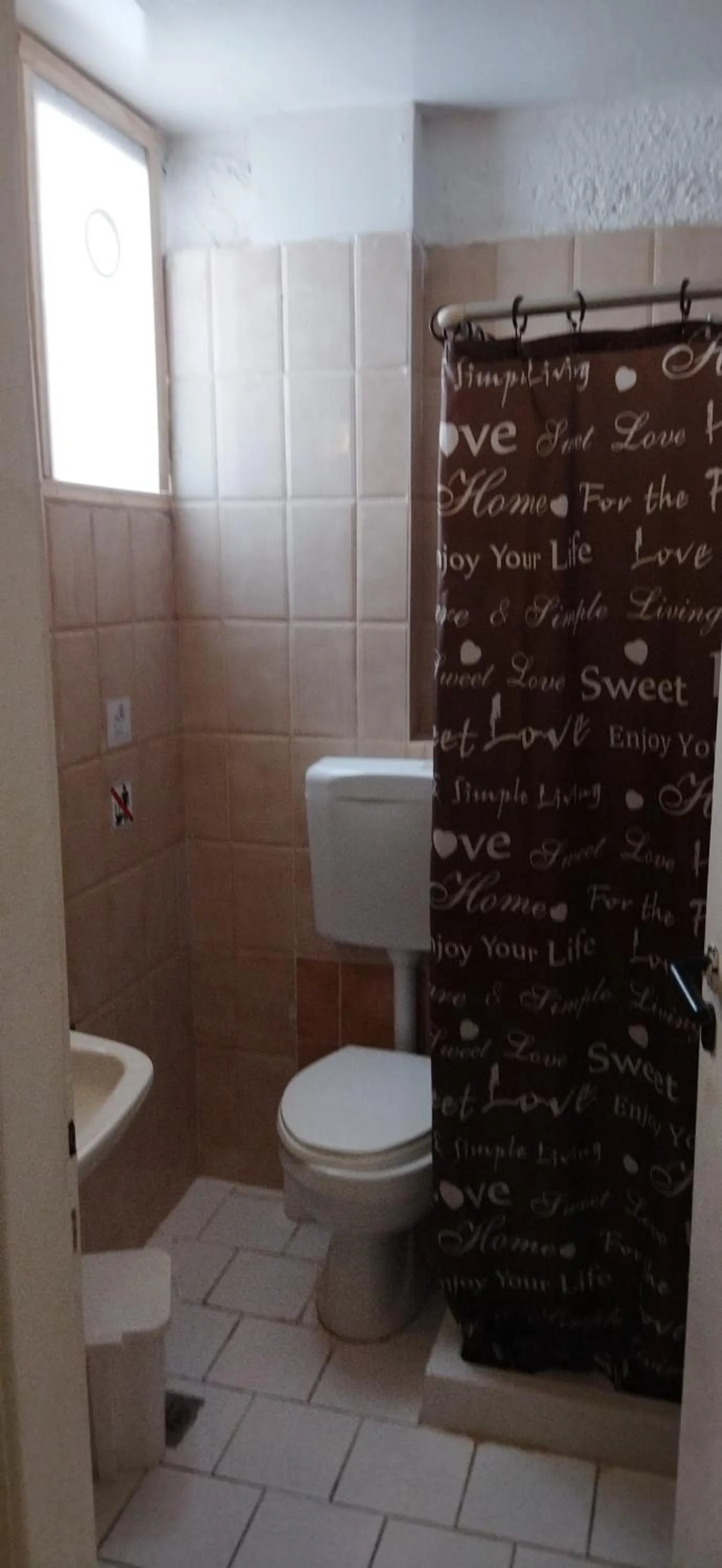 Bathroom in Cleo Rooms 250m from the beach