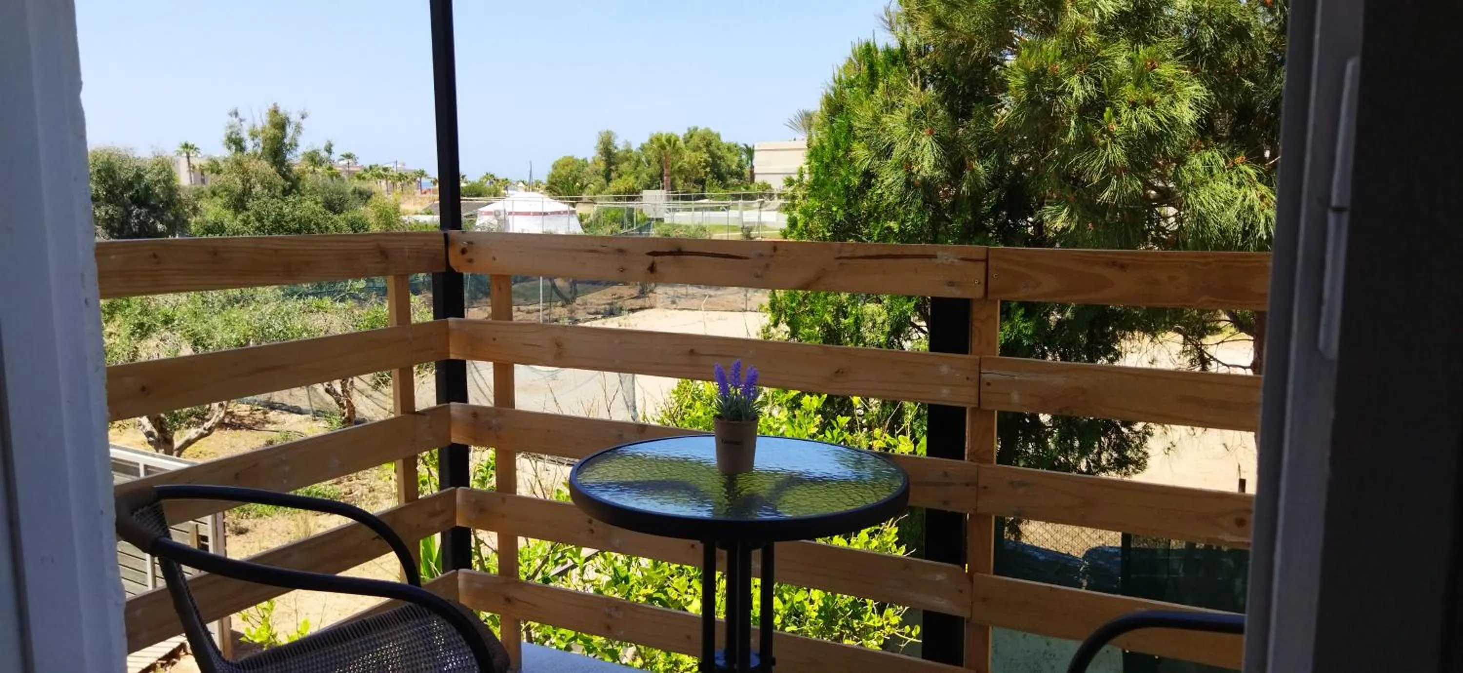 Balcony/Terrace in Cleo Rooms 250m from the beach