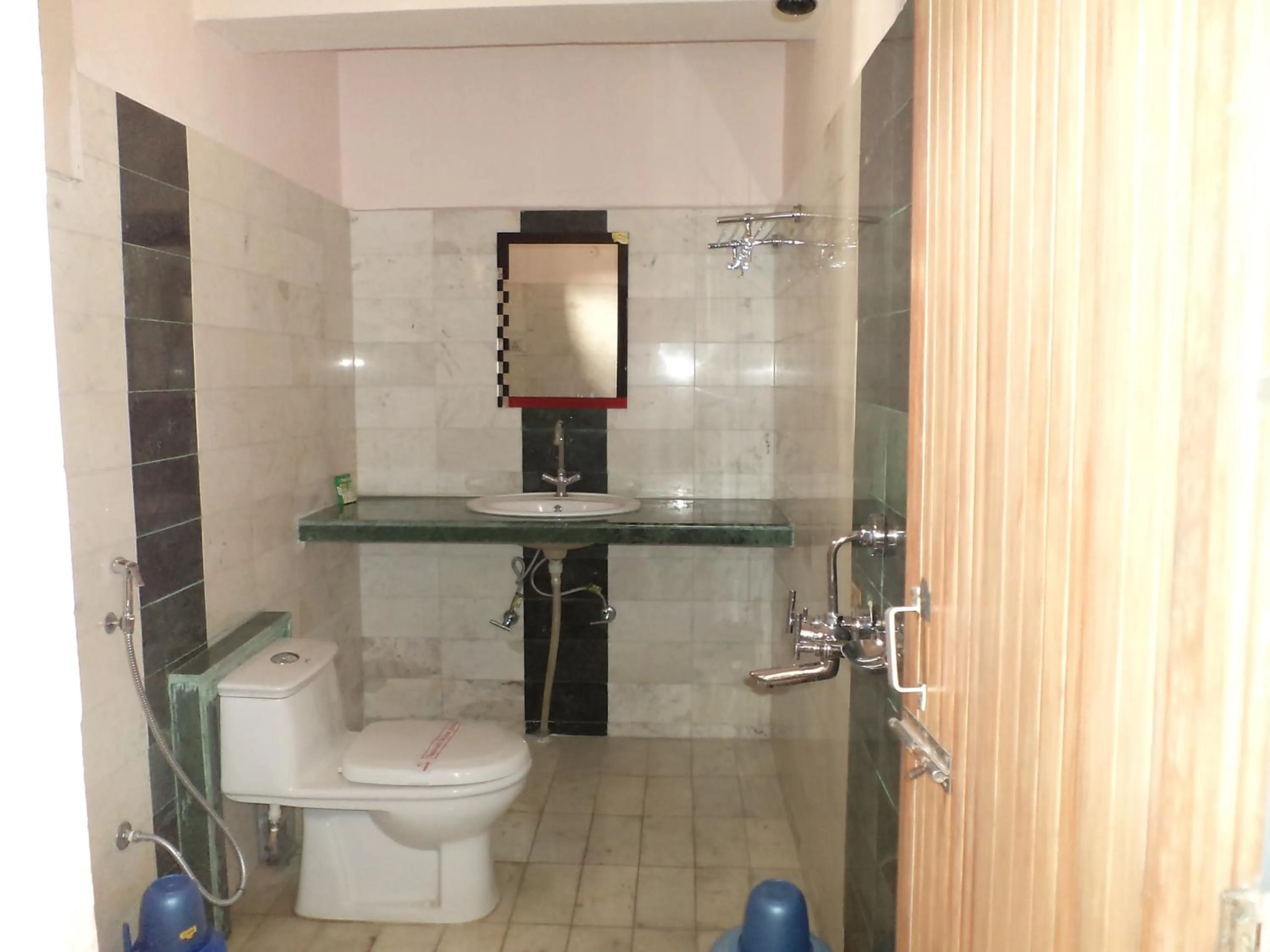 Bathroom in Hotel Mahalaxmi Indo Myanmar