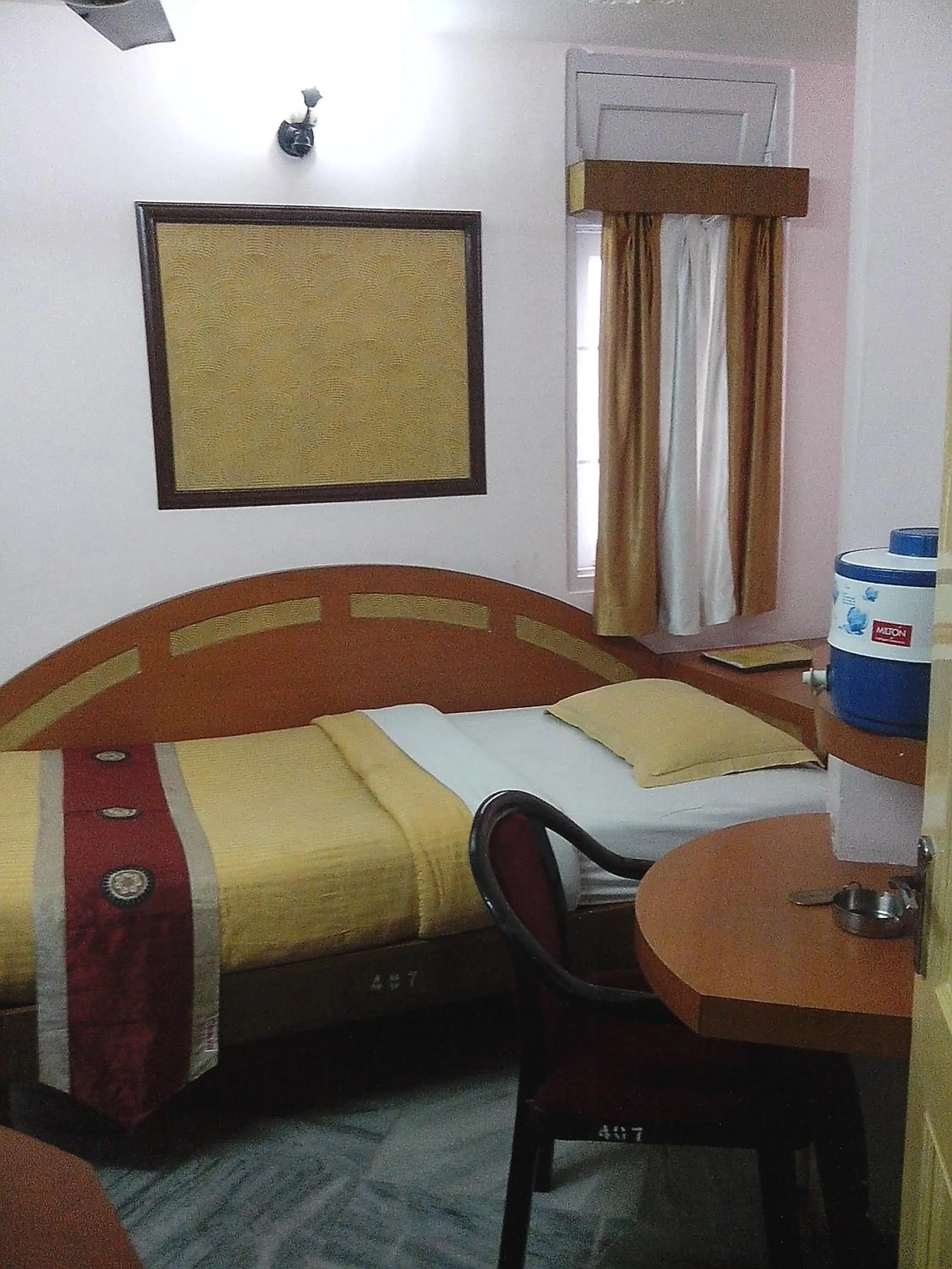 Photo of the whole room, Bed in Hotel Mahalaxmi Indo Myanmar