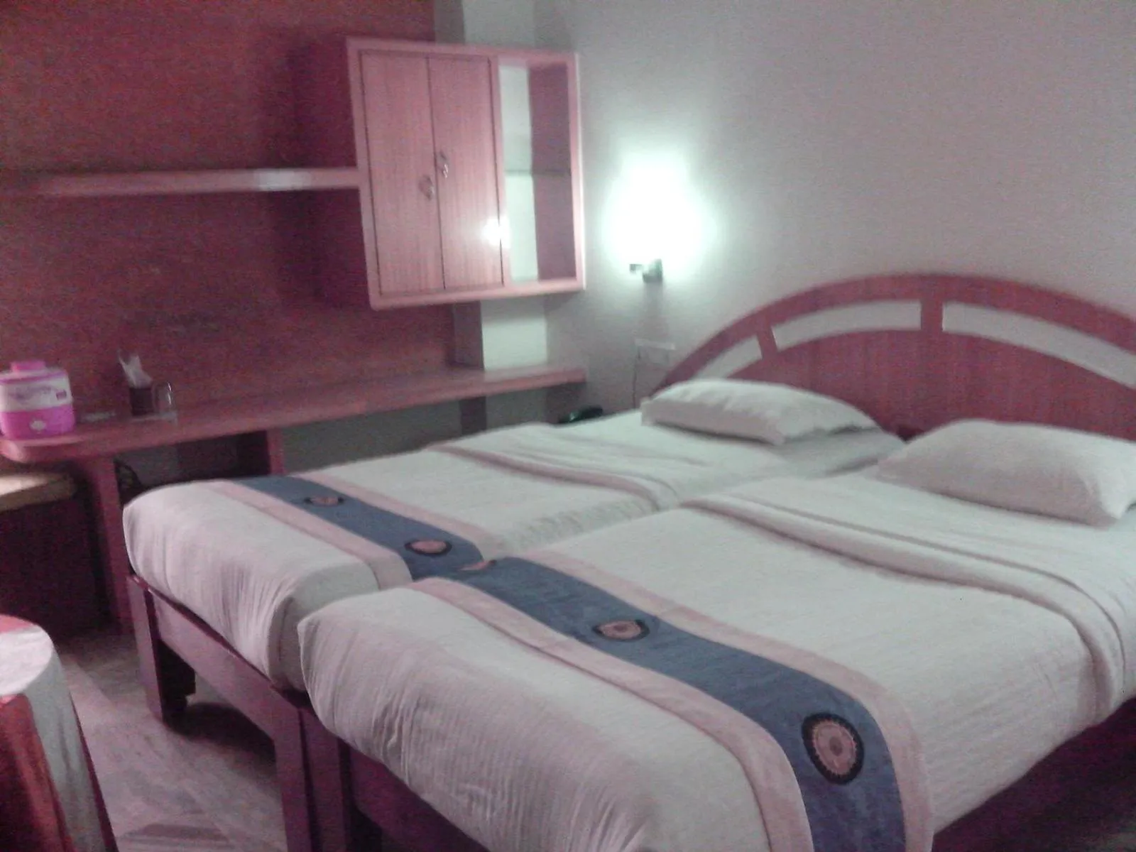 Photo of the whole room, Bed in Hotel Mahalaxmi Indo Myanmar