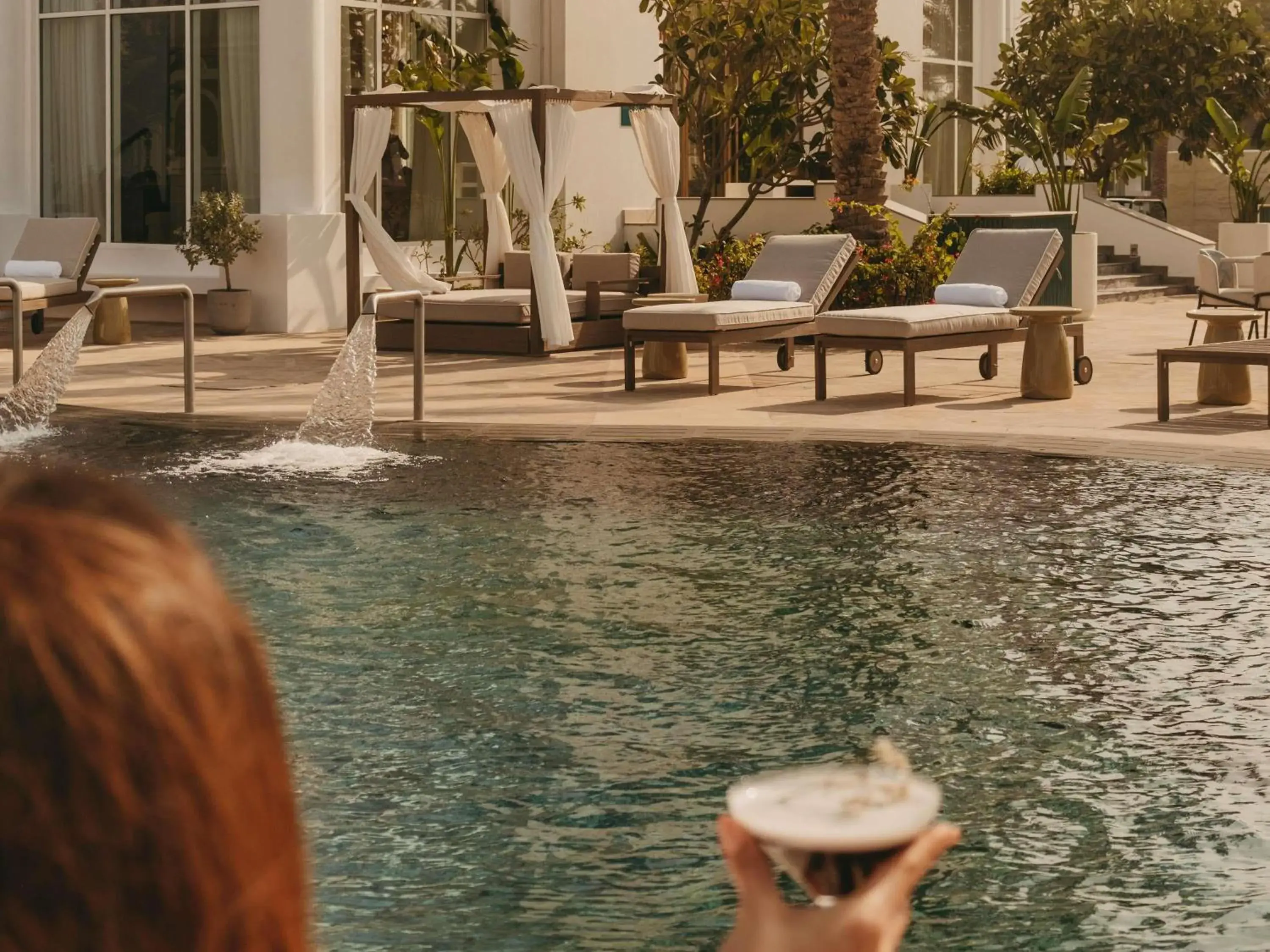 Pool view in Raffles Al Areen Palace Bahrain Pool view in Raffles Al Areen Palace Bahrain