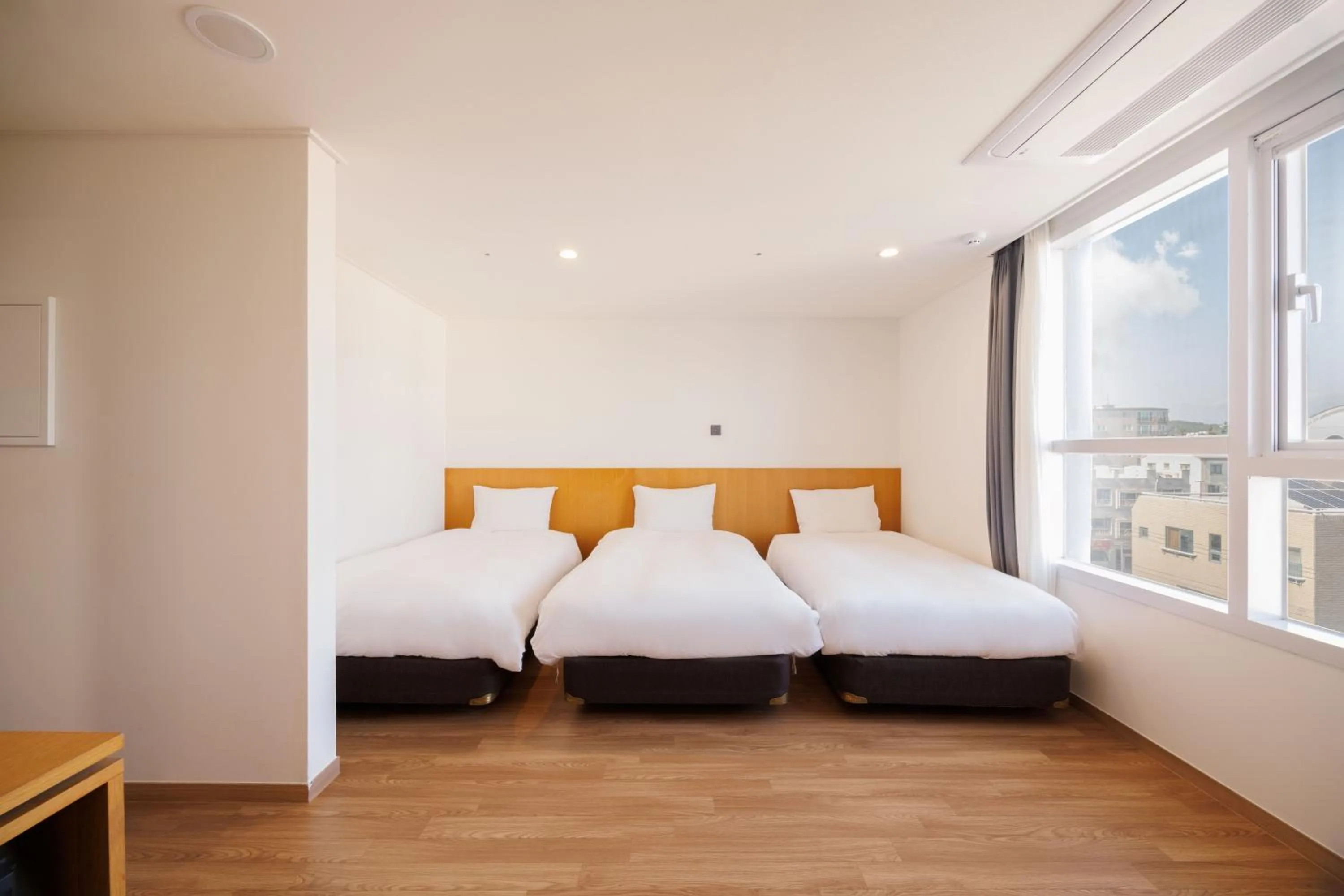 Bed in Kenny Stay Jeju Mosulpo