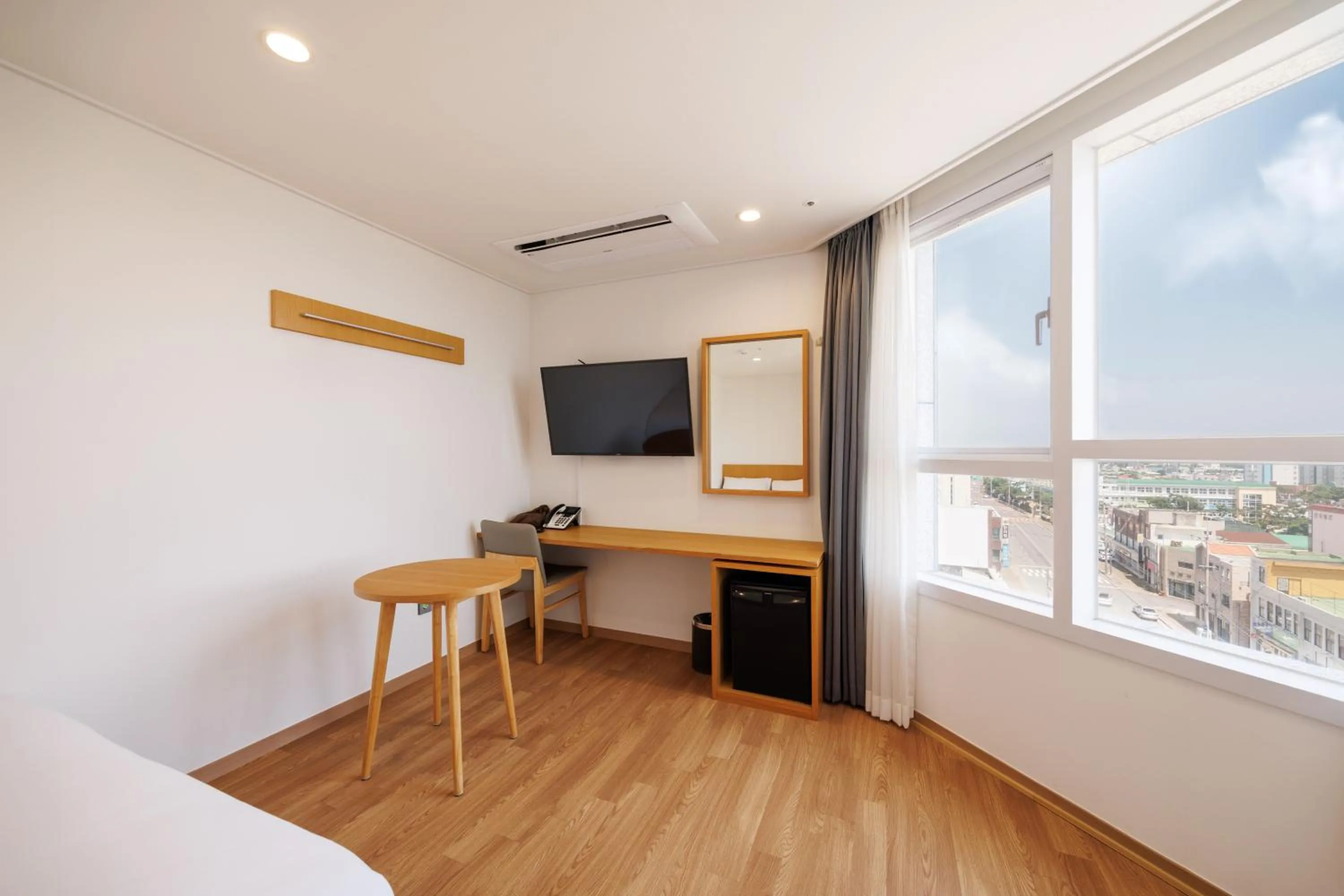 Bed in Kenny Stay Jeju Mosulpo