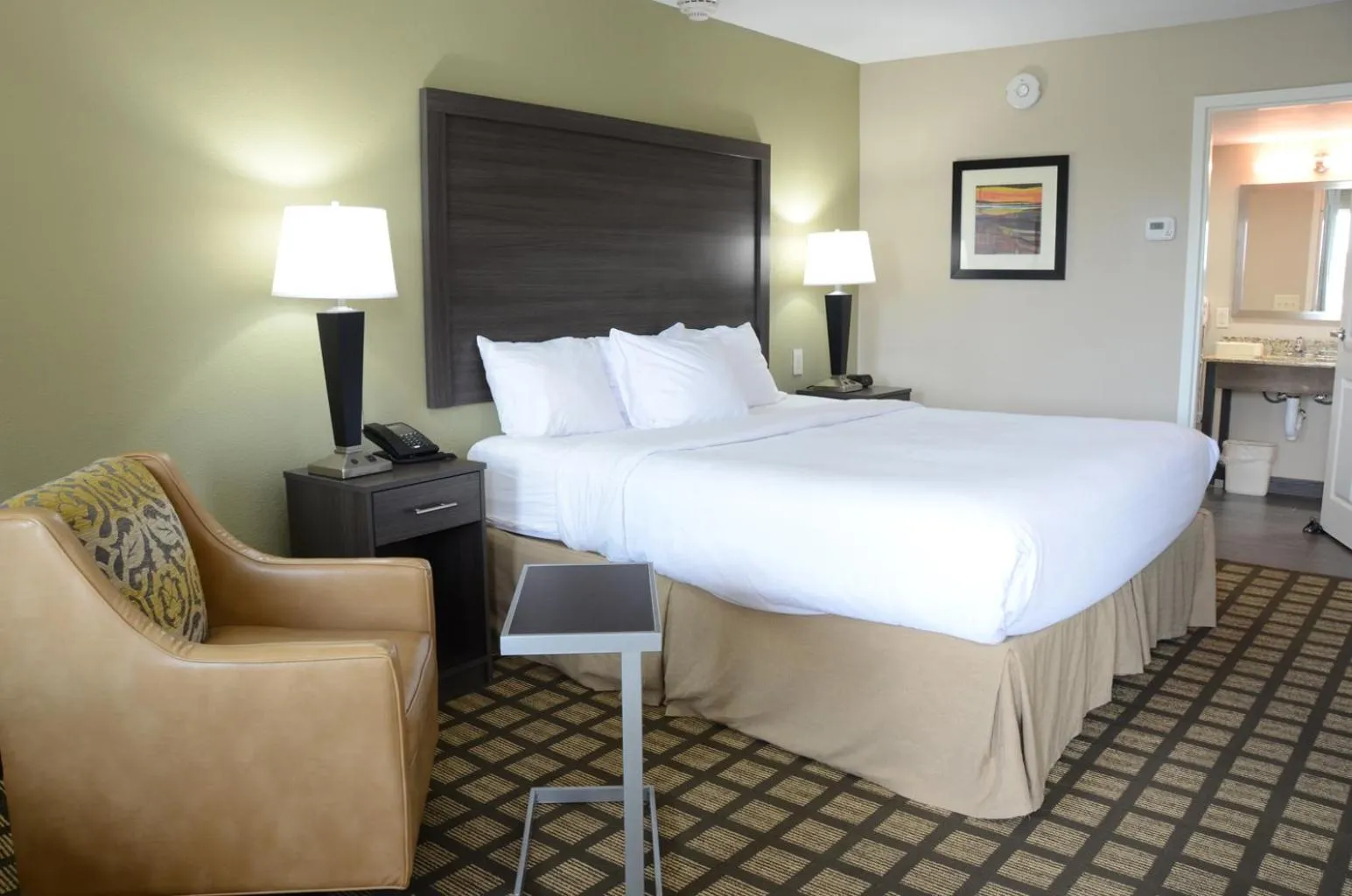 Photo of the whole room, Bed in Baymont by Wyndham Clarksville