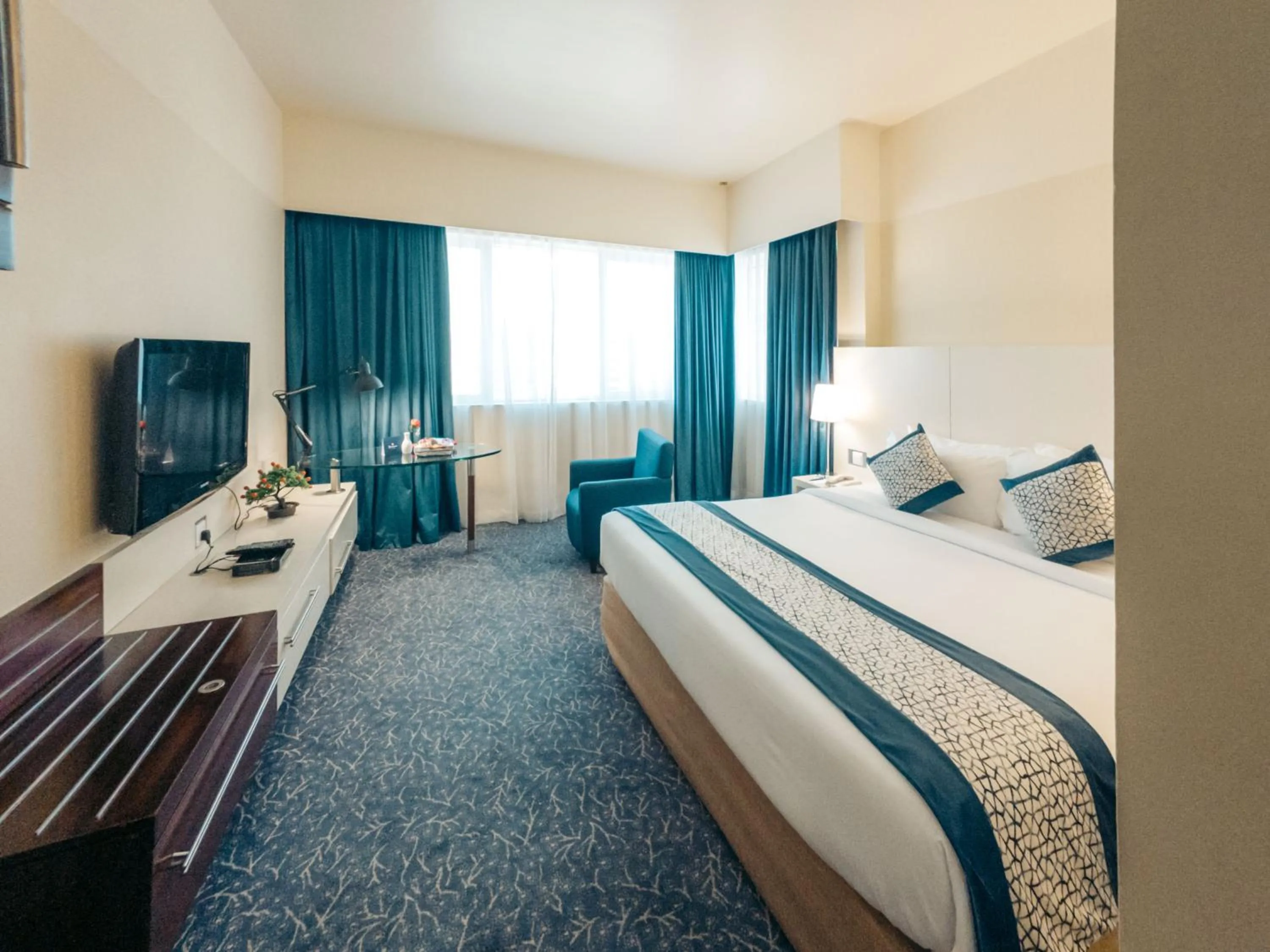 Bed in Kingsgate Hotel by Millennium