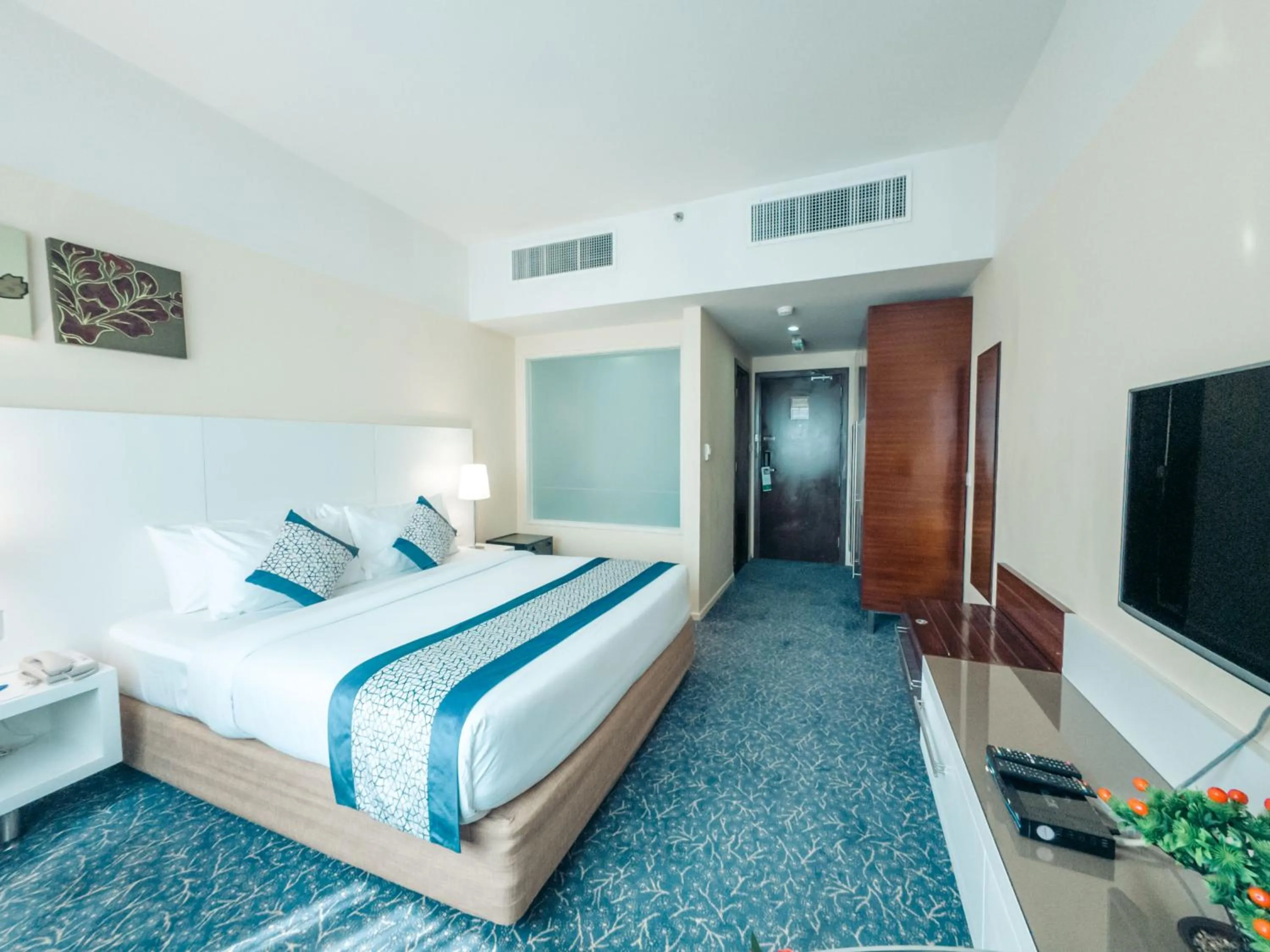 Bed in Kingsgate Hotel by Millennium