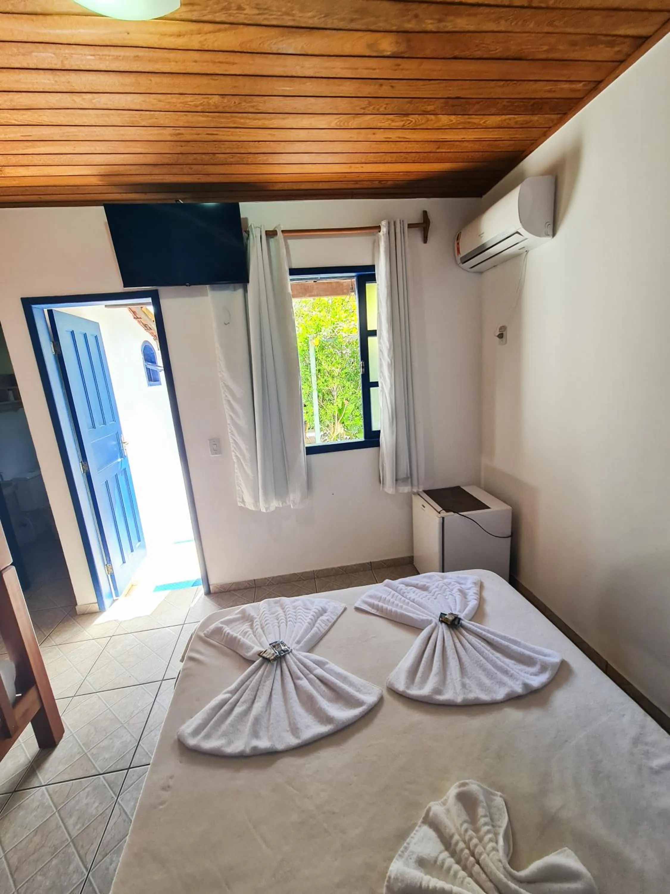 Bed in Pousada Bicho do Mar