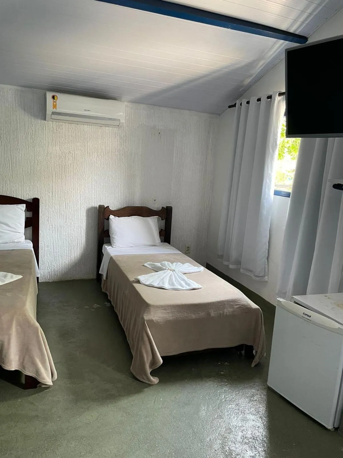 Bed in Pousada Bicho do Mar