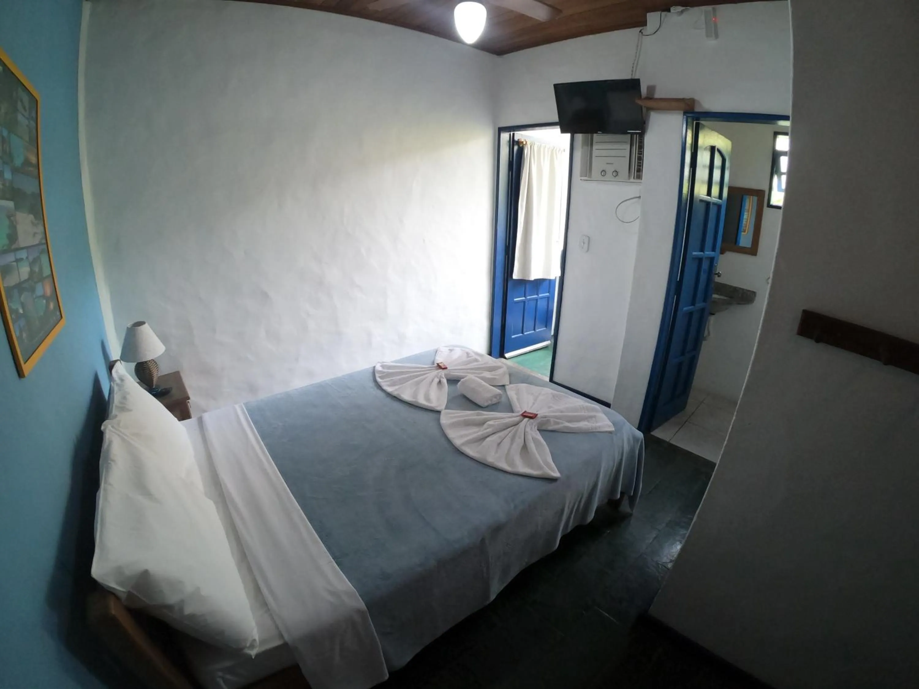 Bed in Pousada Bicho do Mar