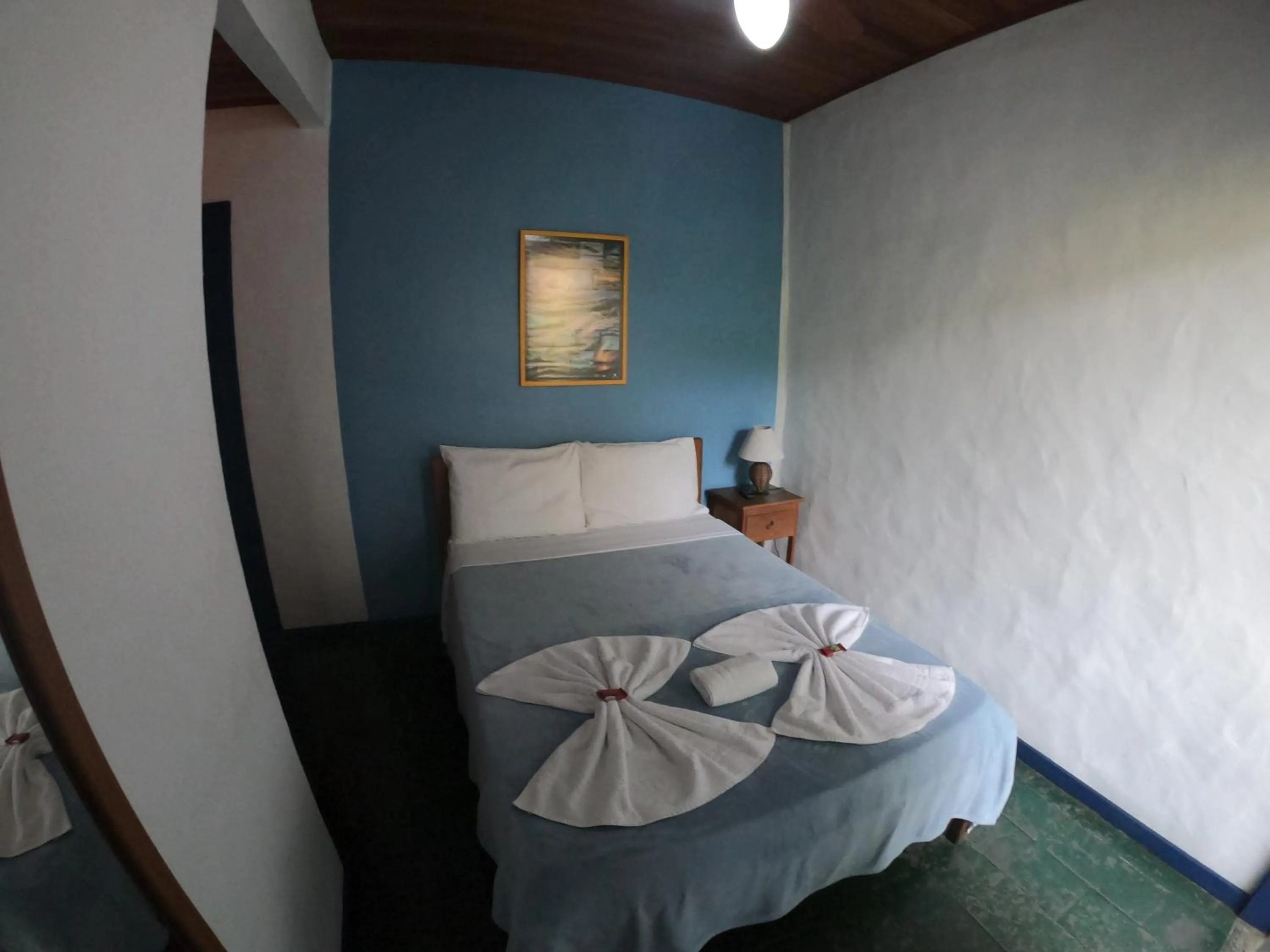 Bed in Pousada Bicho do Mar